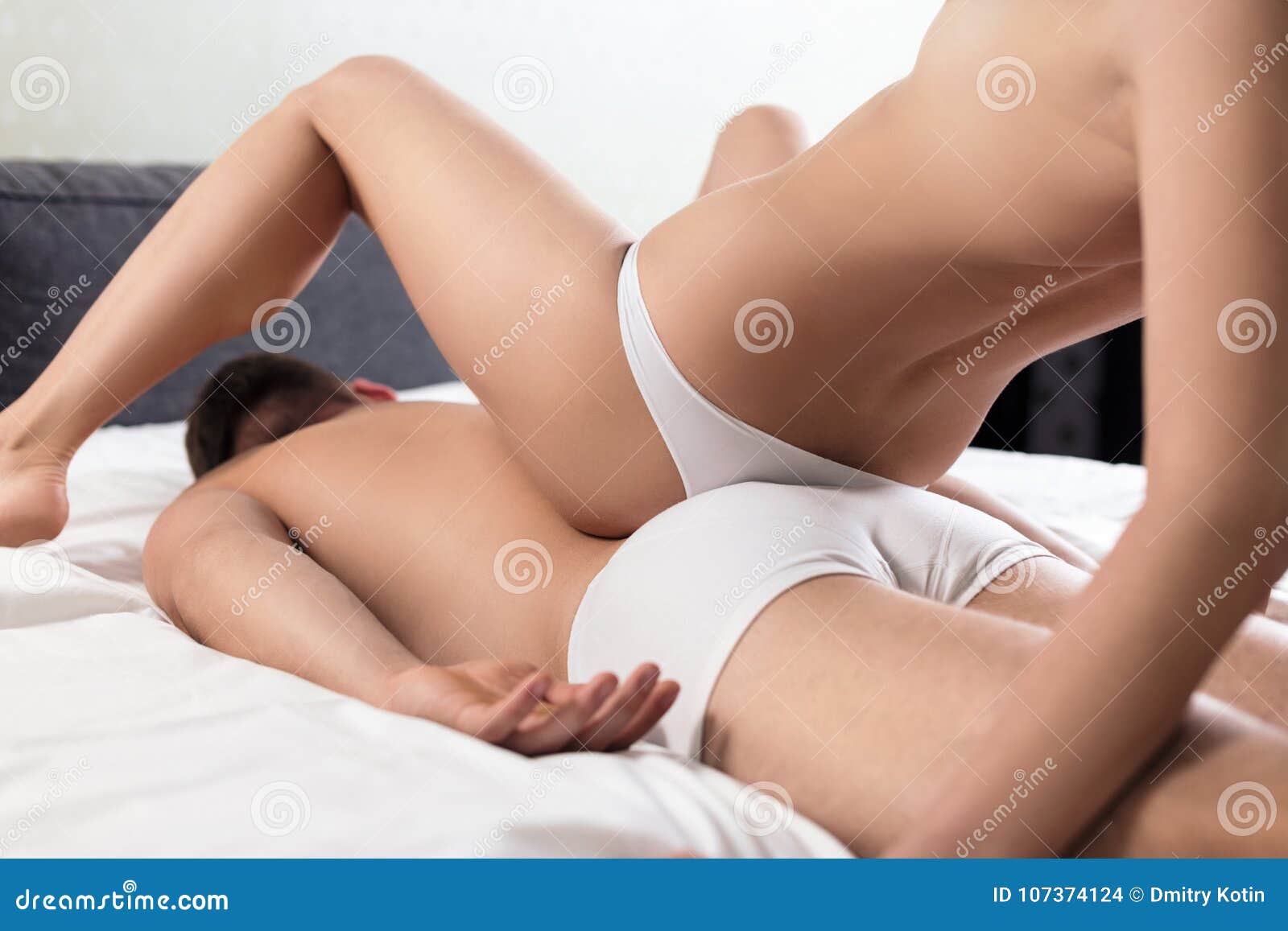 Couple Doing Erotic Massage in Bedroom