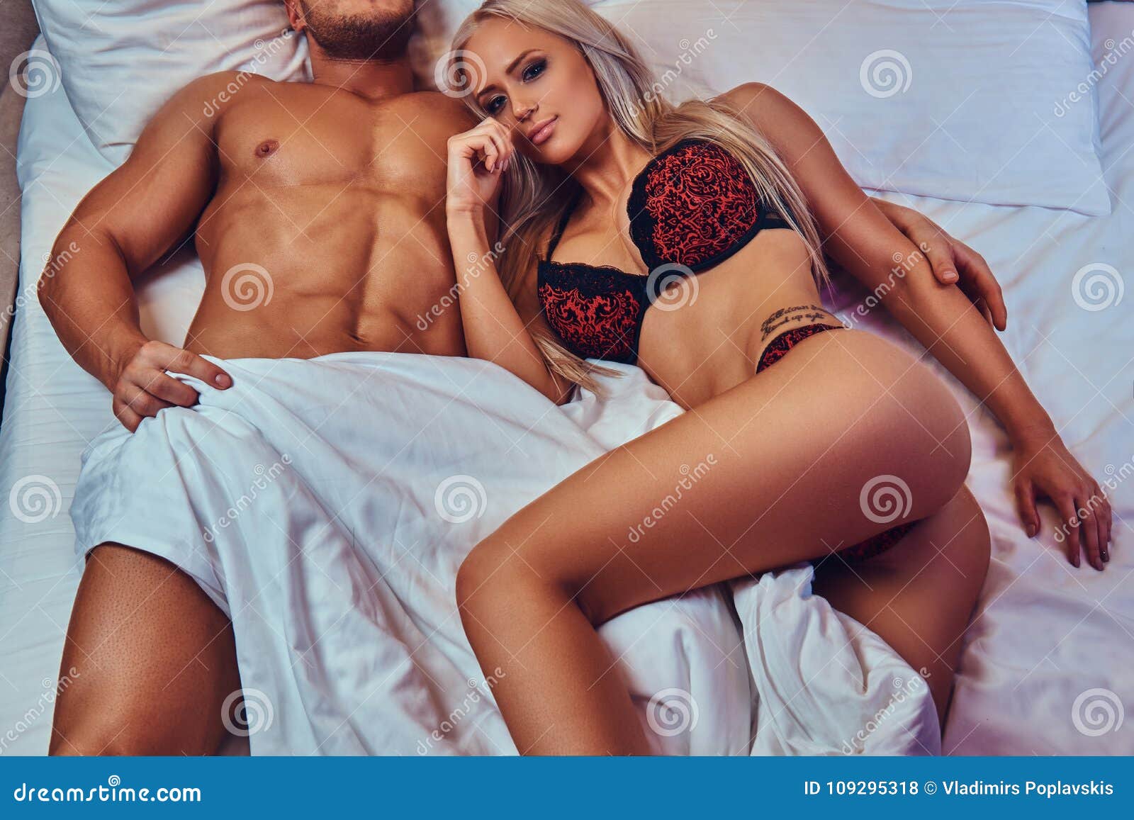 Portrait of Husband and Wife, Relaxing in Bed, Honeymoon