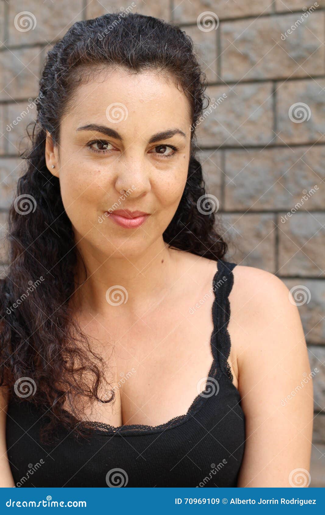 Dressed Mature Woman On Textured Wall Stock Image Image