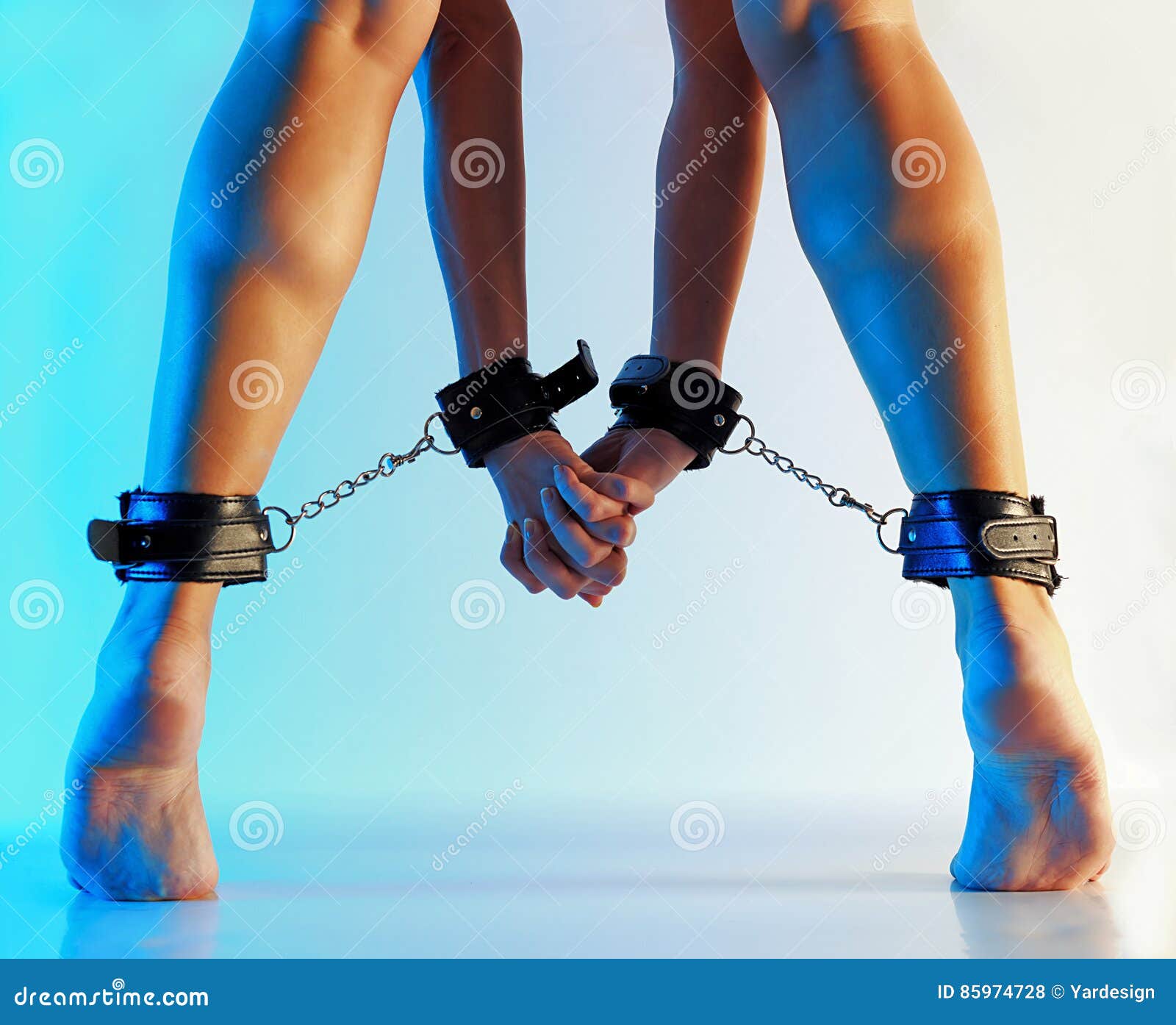 Handcuffs With Bound Feet
