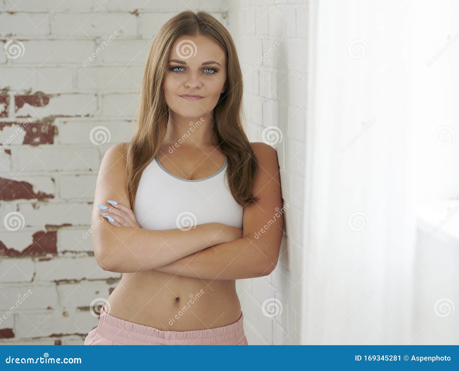 Fitness Model Poses in Lot Studio Stock Image - Image of indoors