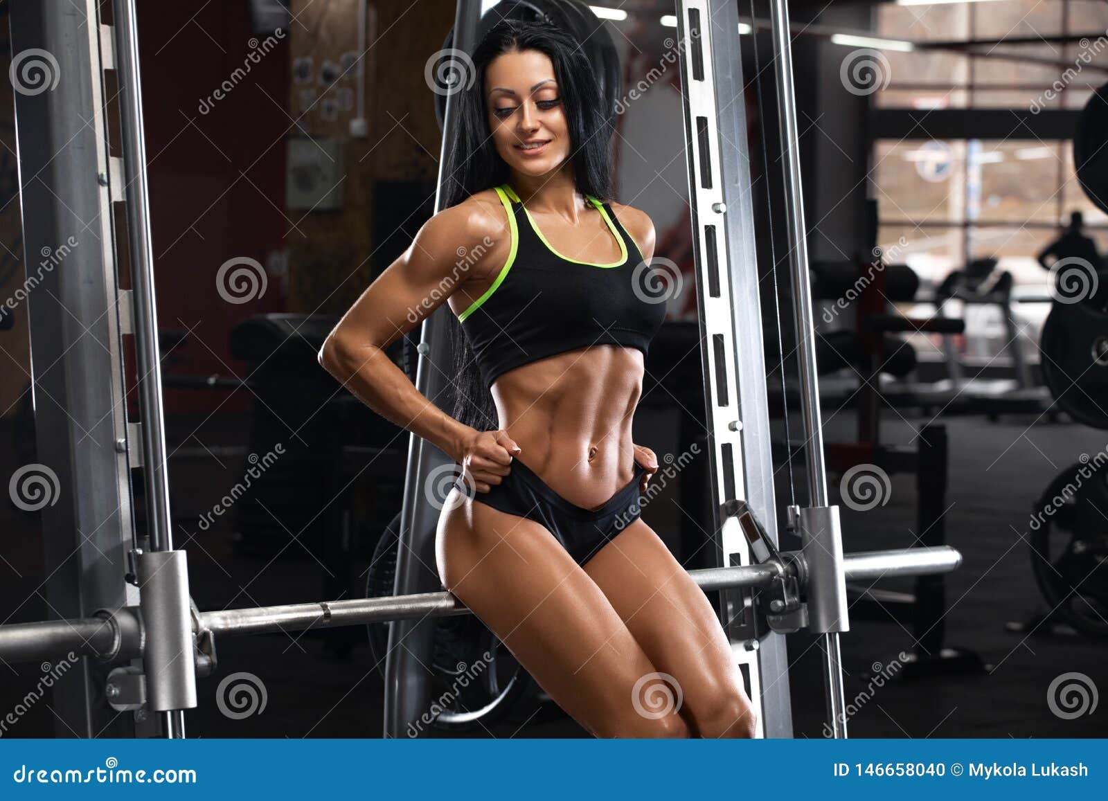 Fitness Woman Pumping Up Muscles Biceps And Triceps Workout Fitness And  Bodybuilding Concept. Pretty Caucasian Girl In The Gym Background Arms  Exercises In Gym Naked Torso Stock Photo, Picture and Royalty Free