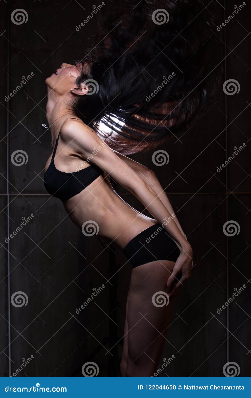 Girl in Black Lingerie Sensual Post Long Black Hair Stock Photo