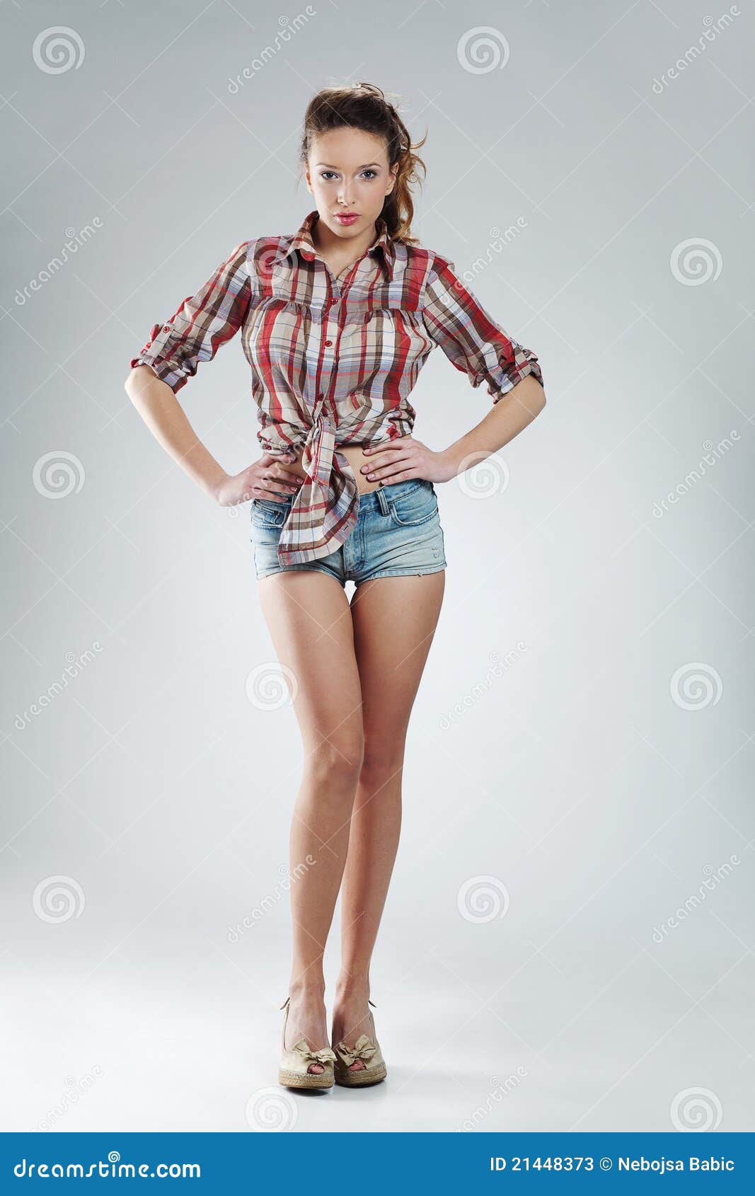 Girl wearing hot pants stock image. Image of long, jeans - 21448373