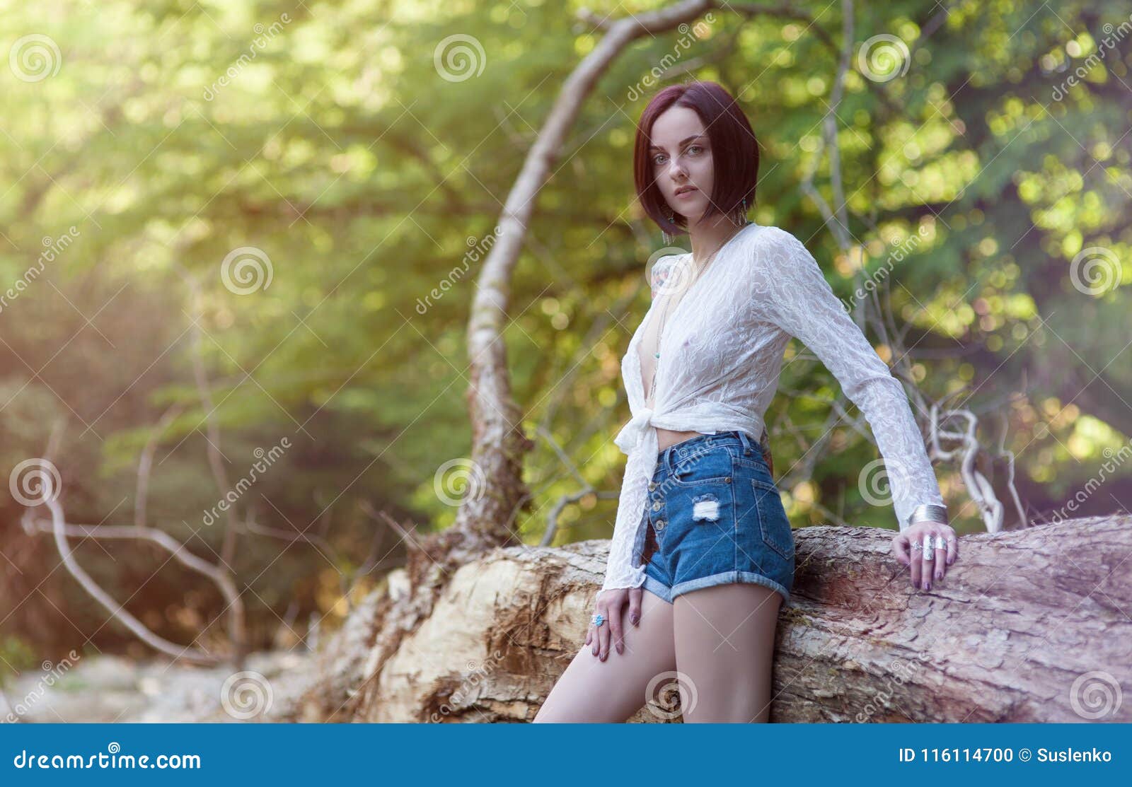 Hippie Girl In Ornaments Boho Chic Stands Near A Huge Tree Stock Photo