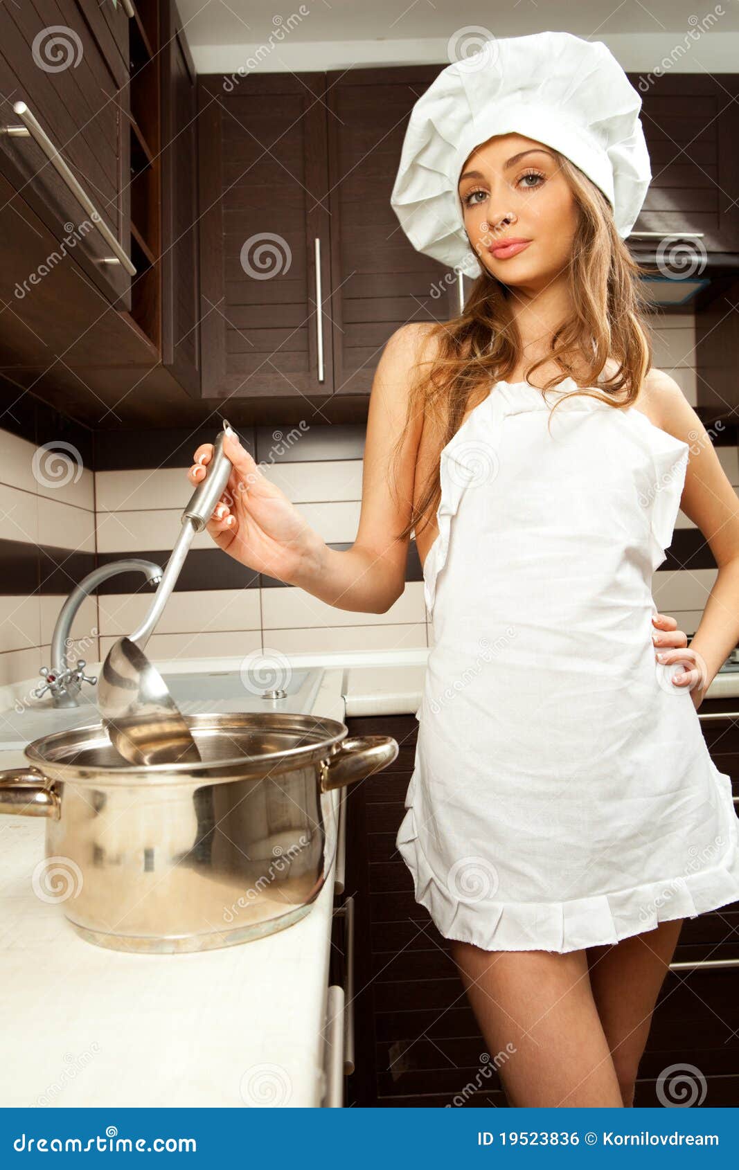 Housewife Tasting Royalty Free Stock Image