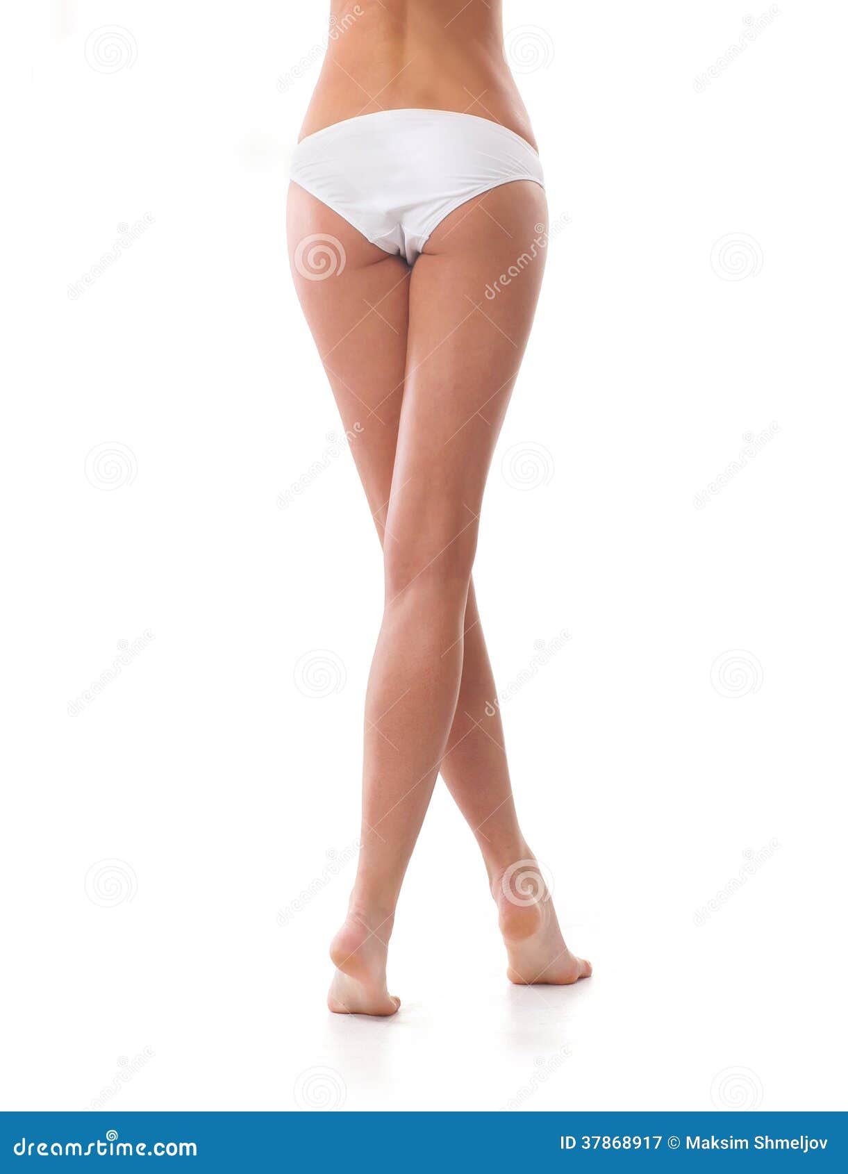 Long, hot legs in a short white skirt and a white thong