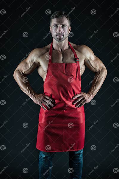 Man Cook Man With Muscular Torso In Chef Apron Cuisine Male Housewife Husband In Kitchen 