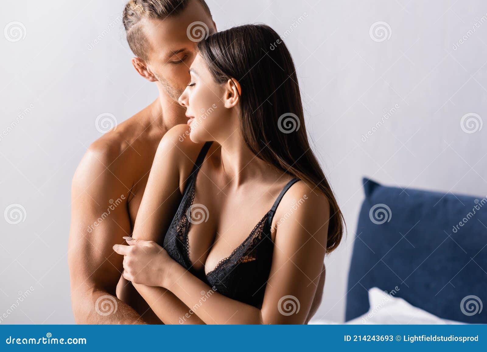 Man Kissing Girlfriend in Black Stock Image image