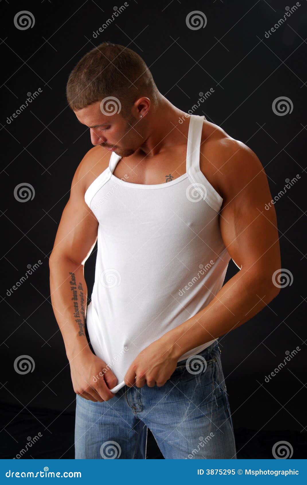 Man in Muscle Shirt stock image. Image of tank, bulging 3875295