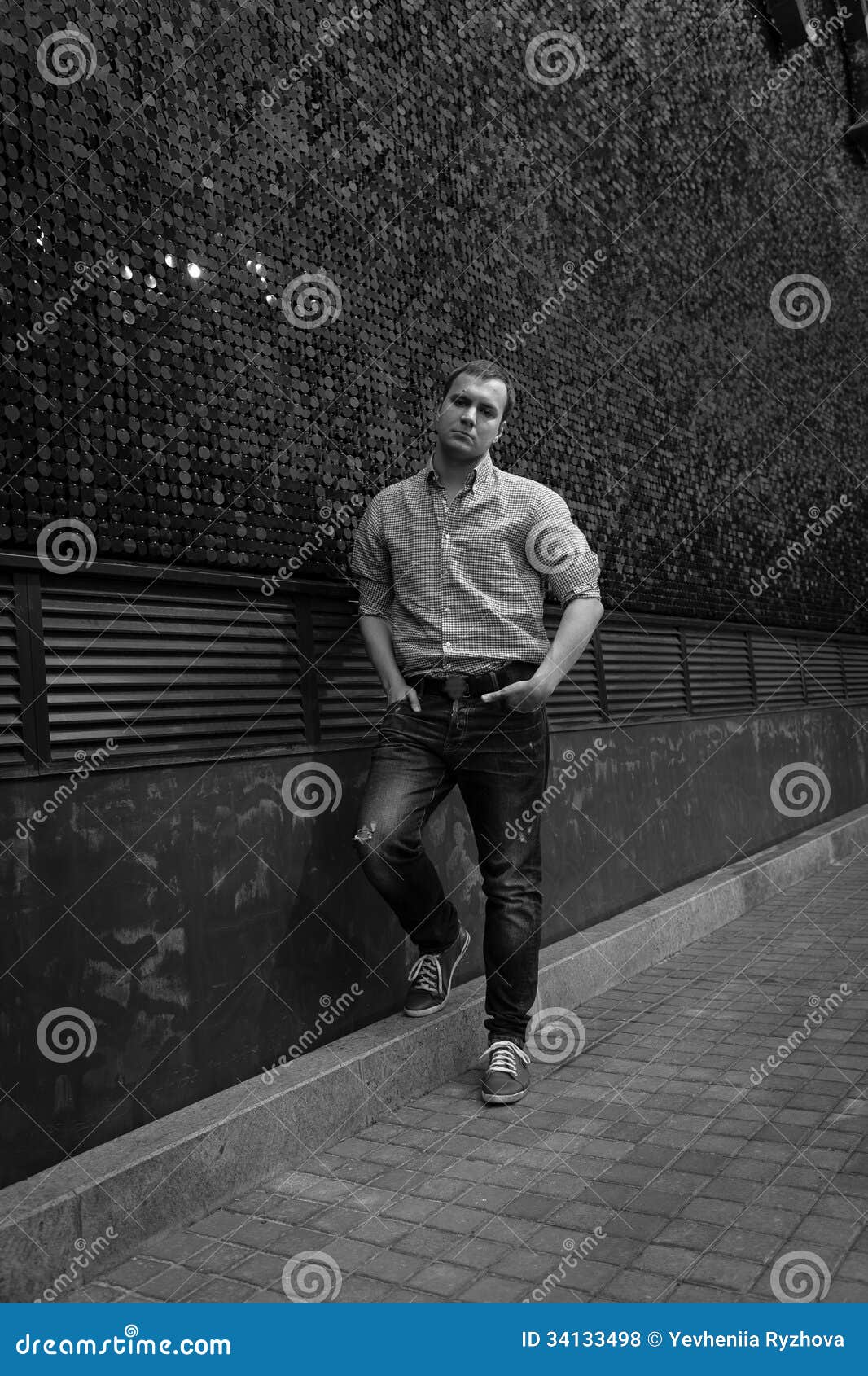 Man posing near wall stock photo. Image of city, hair - 34133498