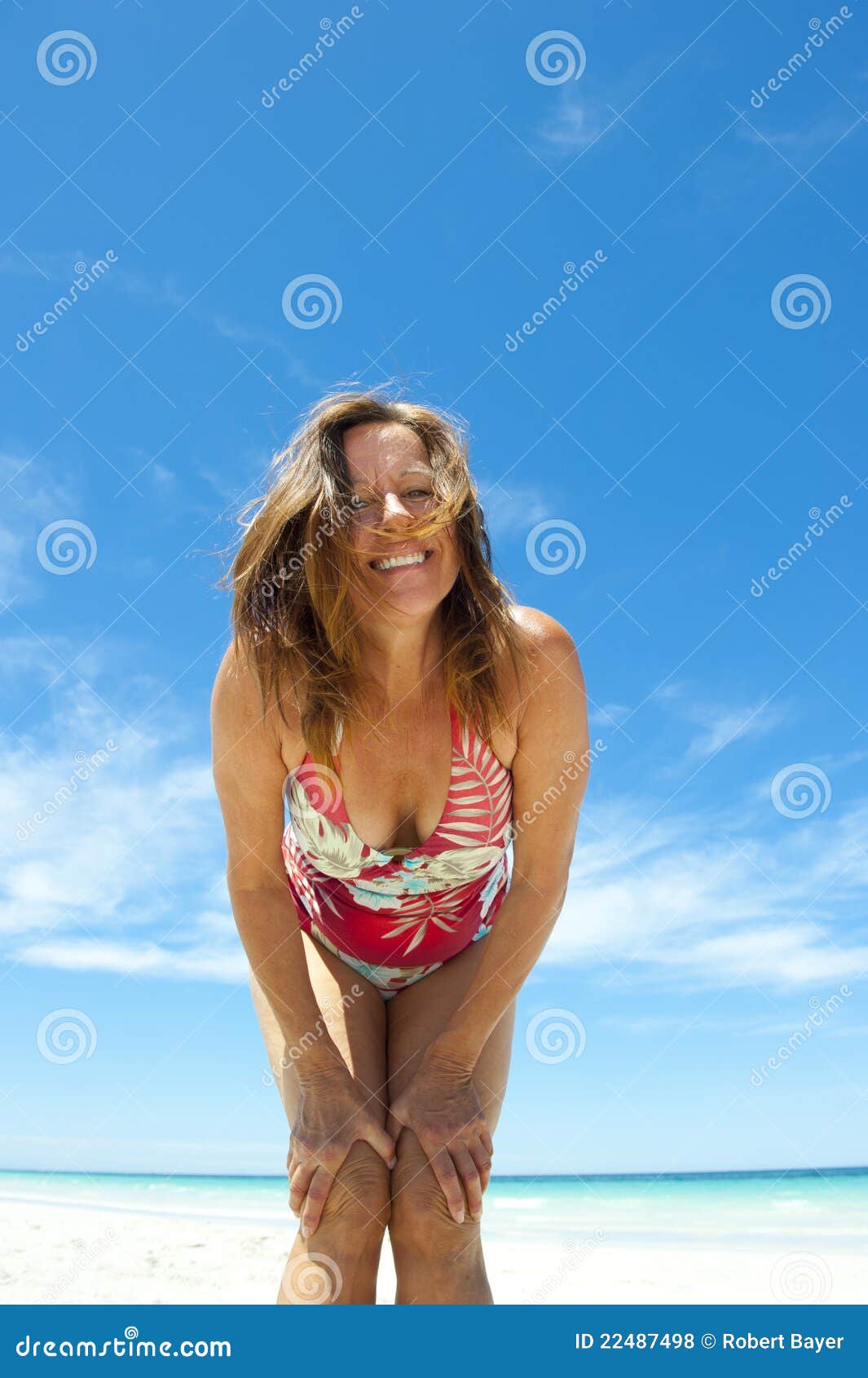 Mature Woman at Tropical Beach Stock Photo