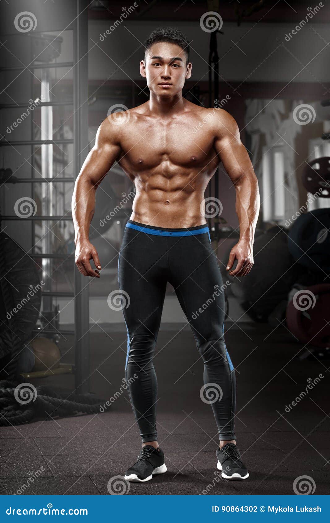 Asian Muscular Man Posing In Gym, Shaped Abdominal. Strong 