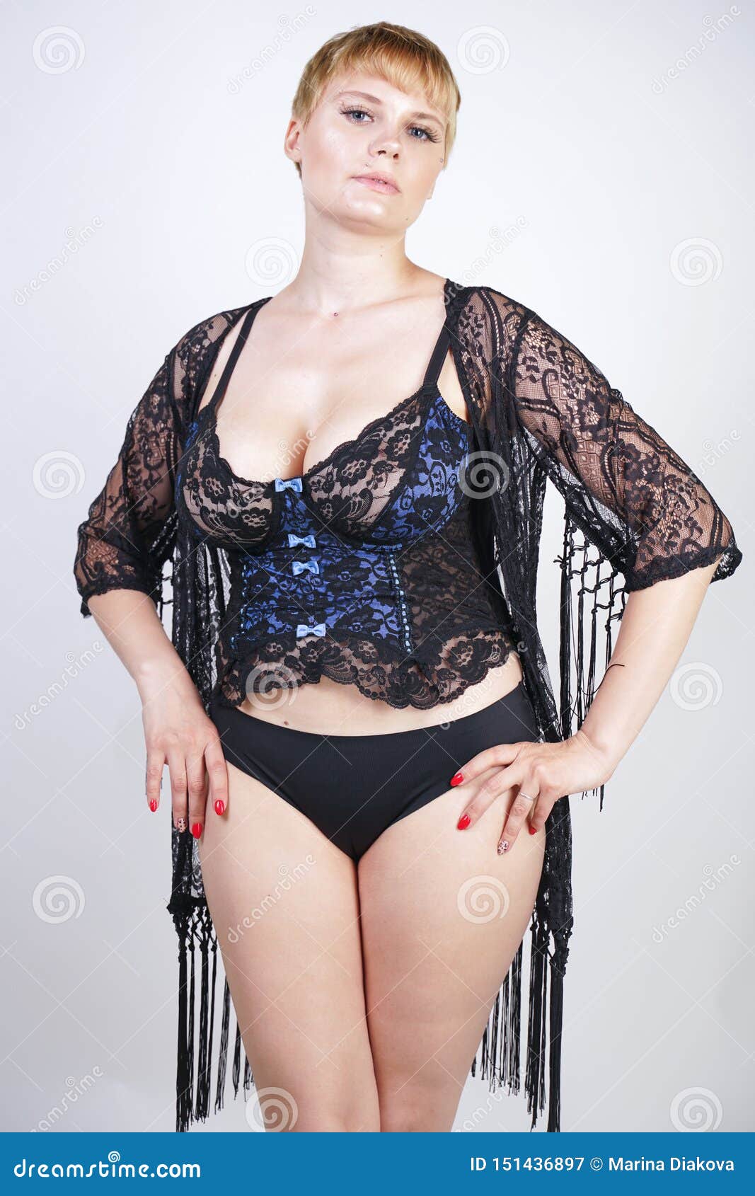 Plus Size Woman with Short Hair in Blue and Black Lace Corset