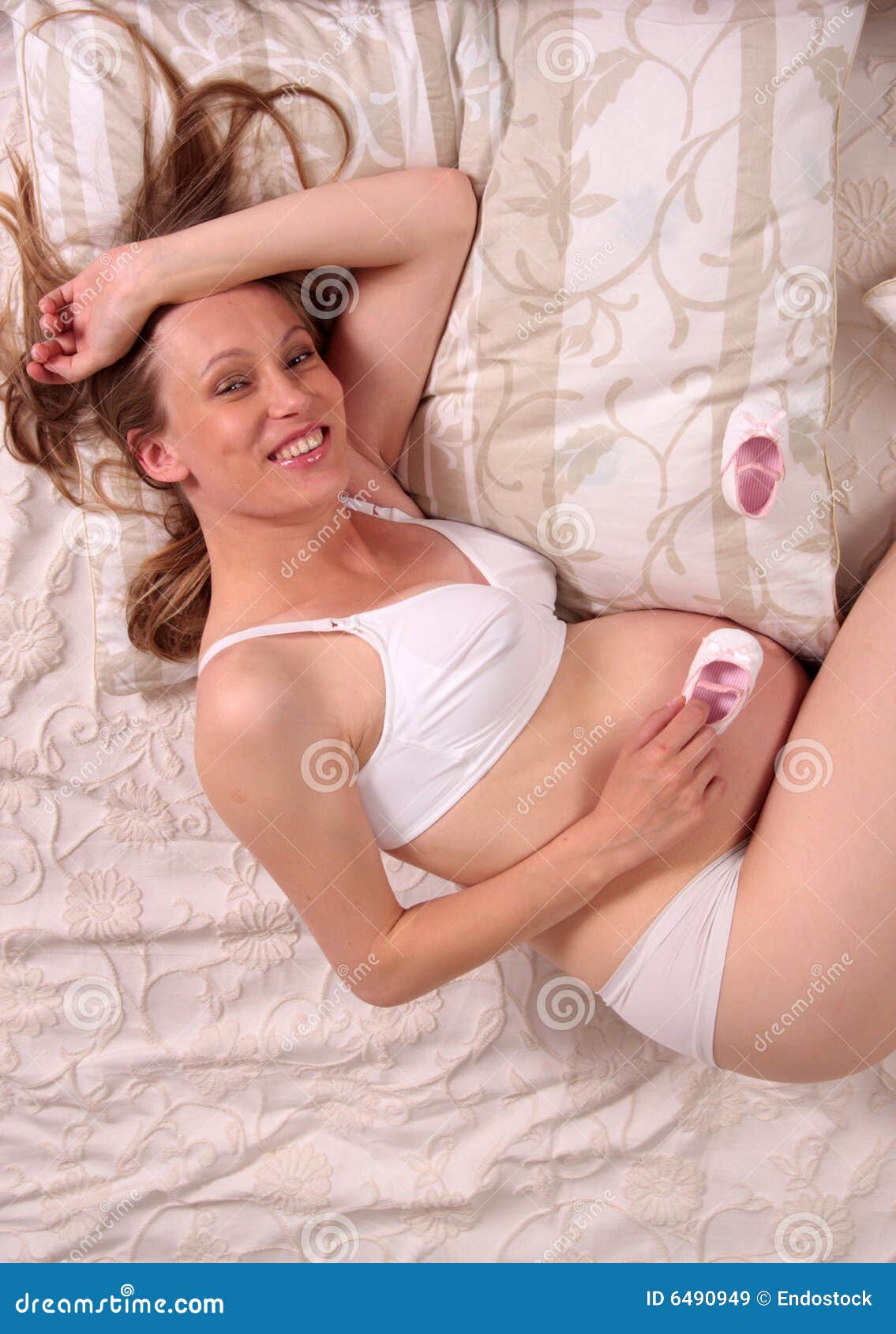 Sexy Pregnant Woman In Lingerie. Stock Photo, Picture and Royalty