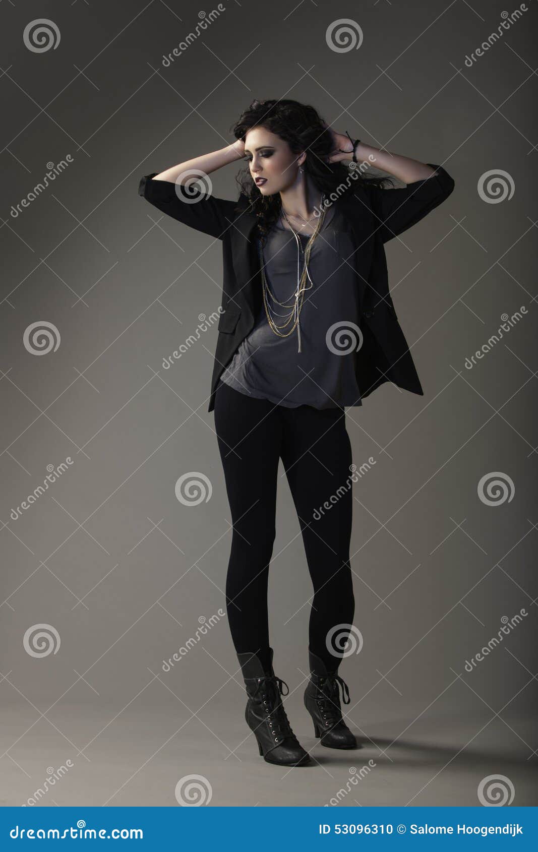 rocker girl wearing edgy outfit and makeup