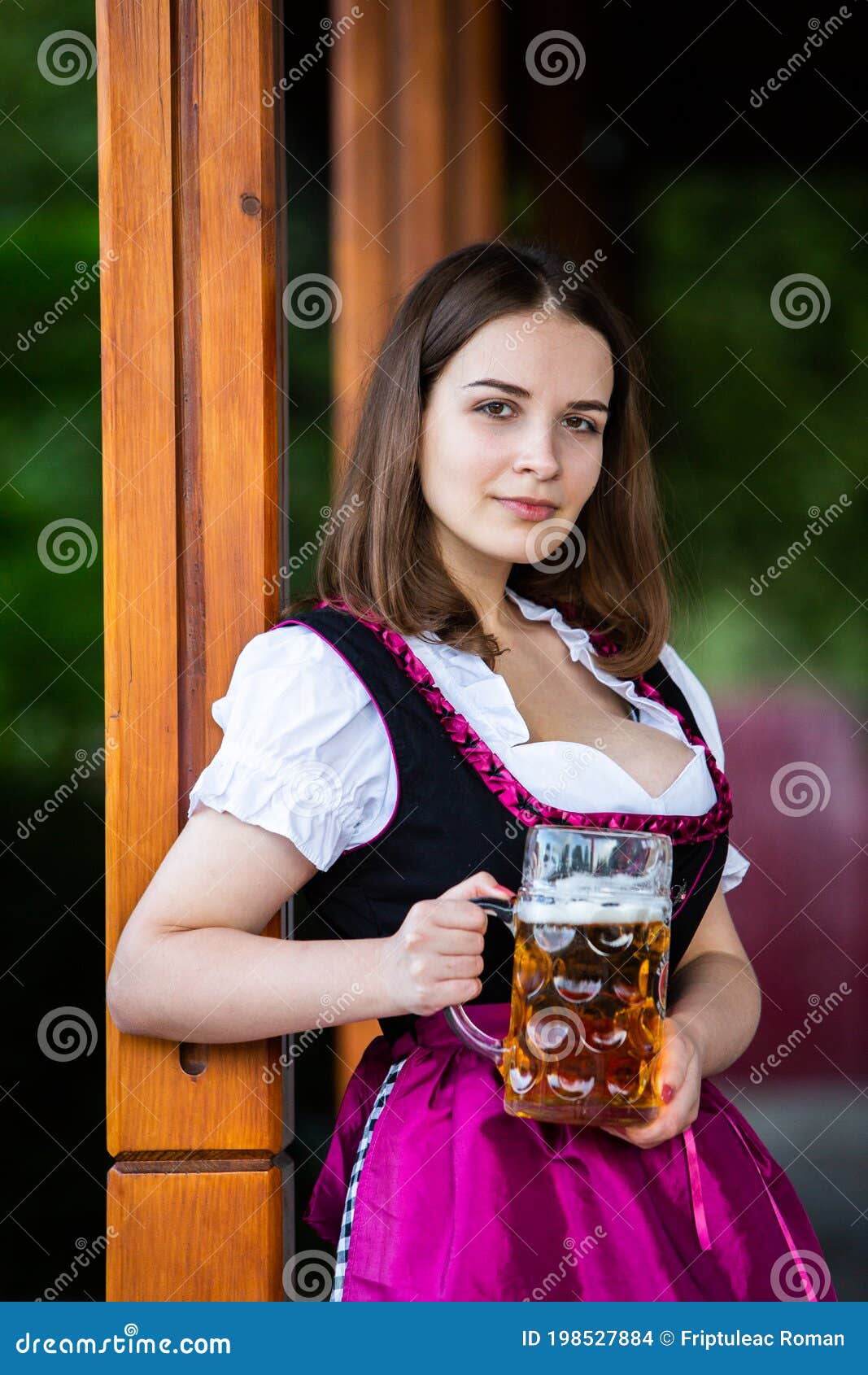 Russian Woman in Bavarian Dress Holding Beer Mugs. Stock Photo - Image ...