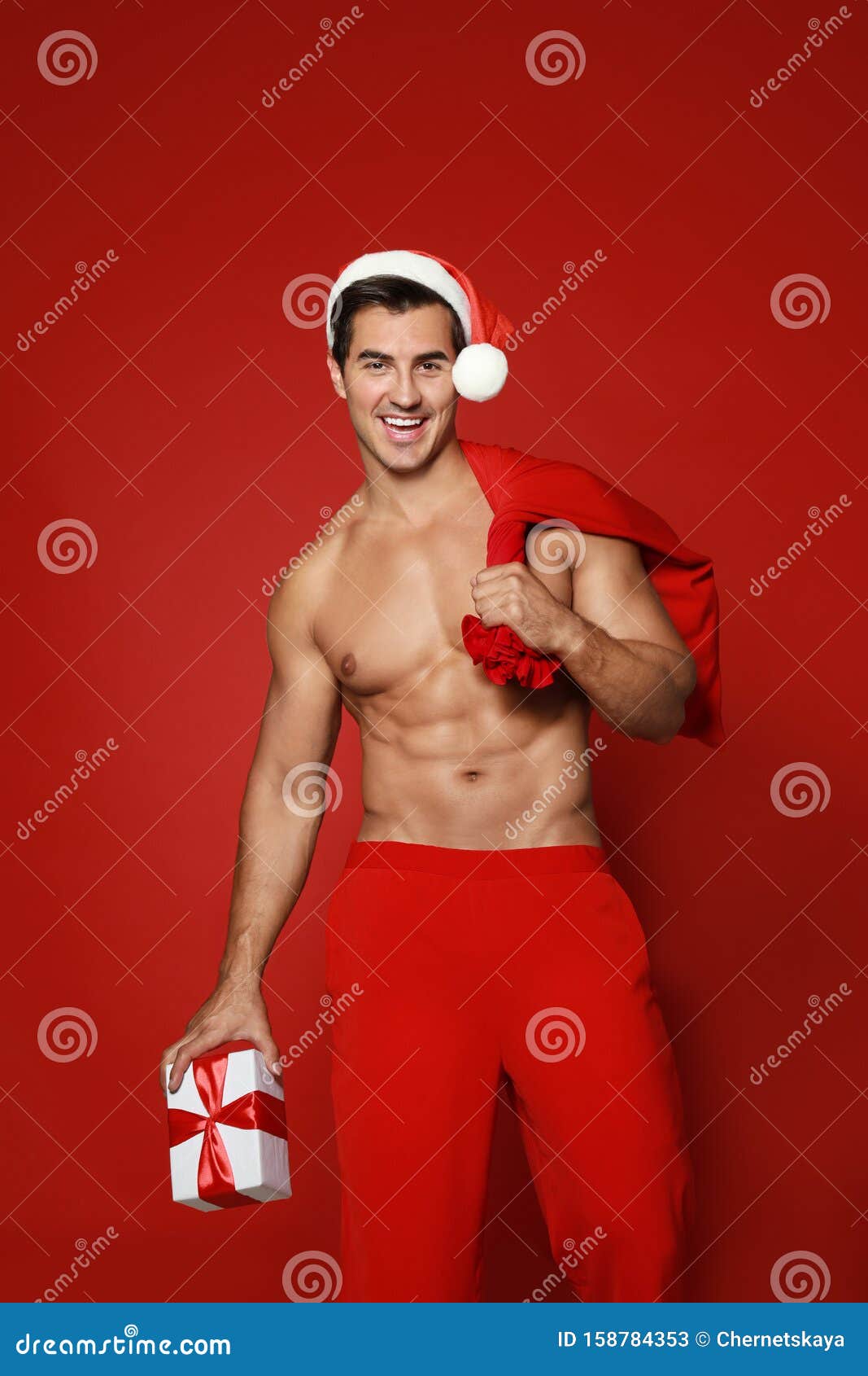 https://thumbs.dreamstime.com/z/sexy-shirtless-santa-claus-gift-background-sexy-shirtless-santa-claus-gift-red-background-158784353.jpg