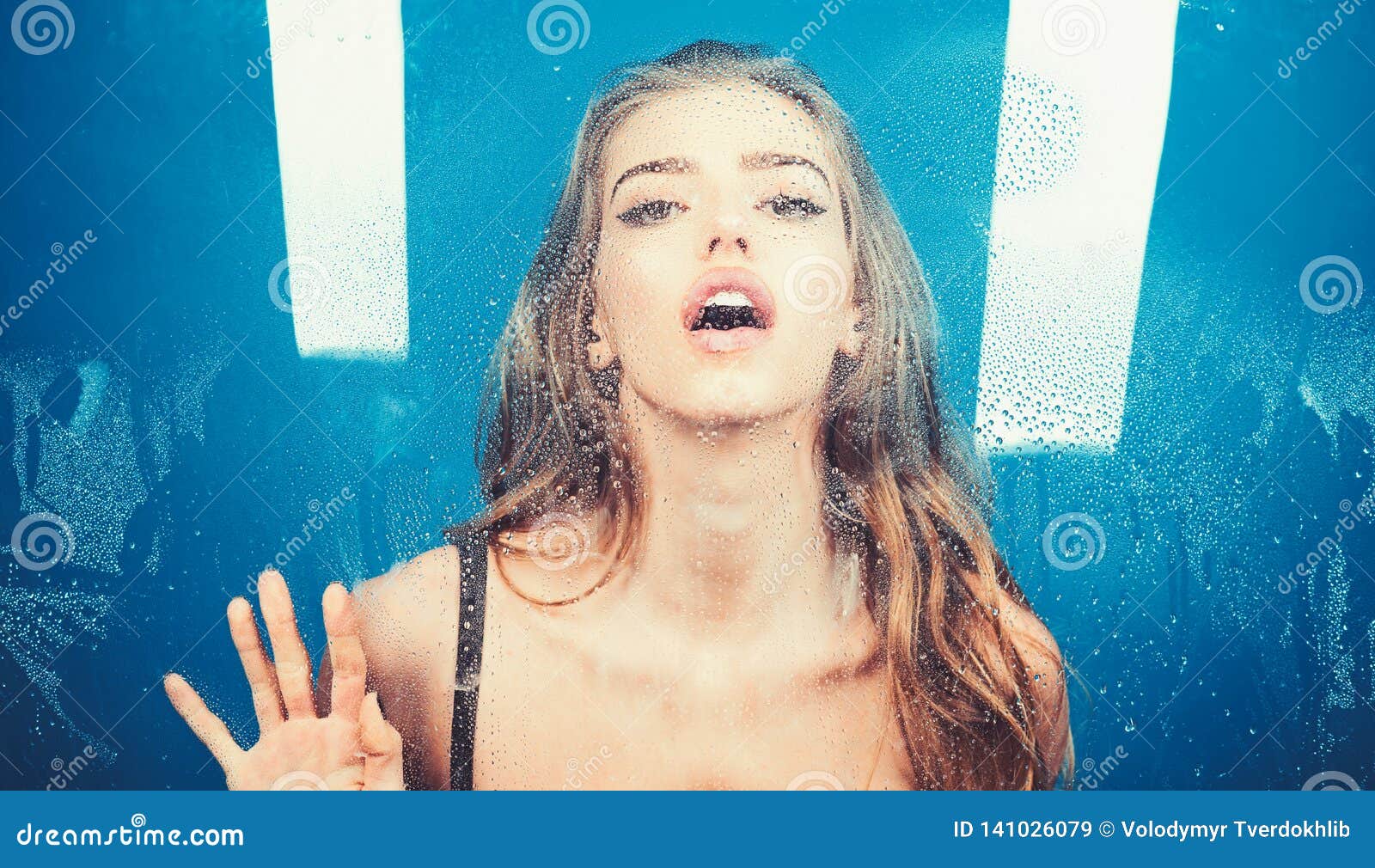 Woman Behind Plastic Sheet With Water Drops Shower And Hygiene Spa Treatment Window With Water