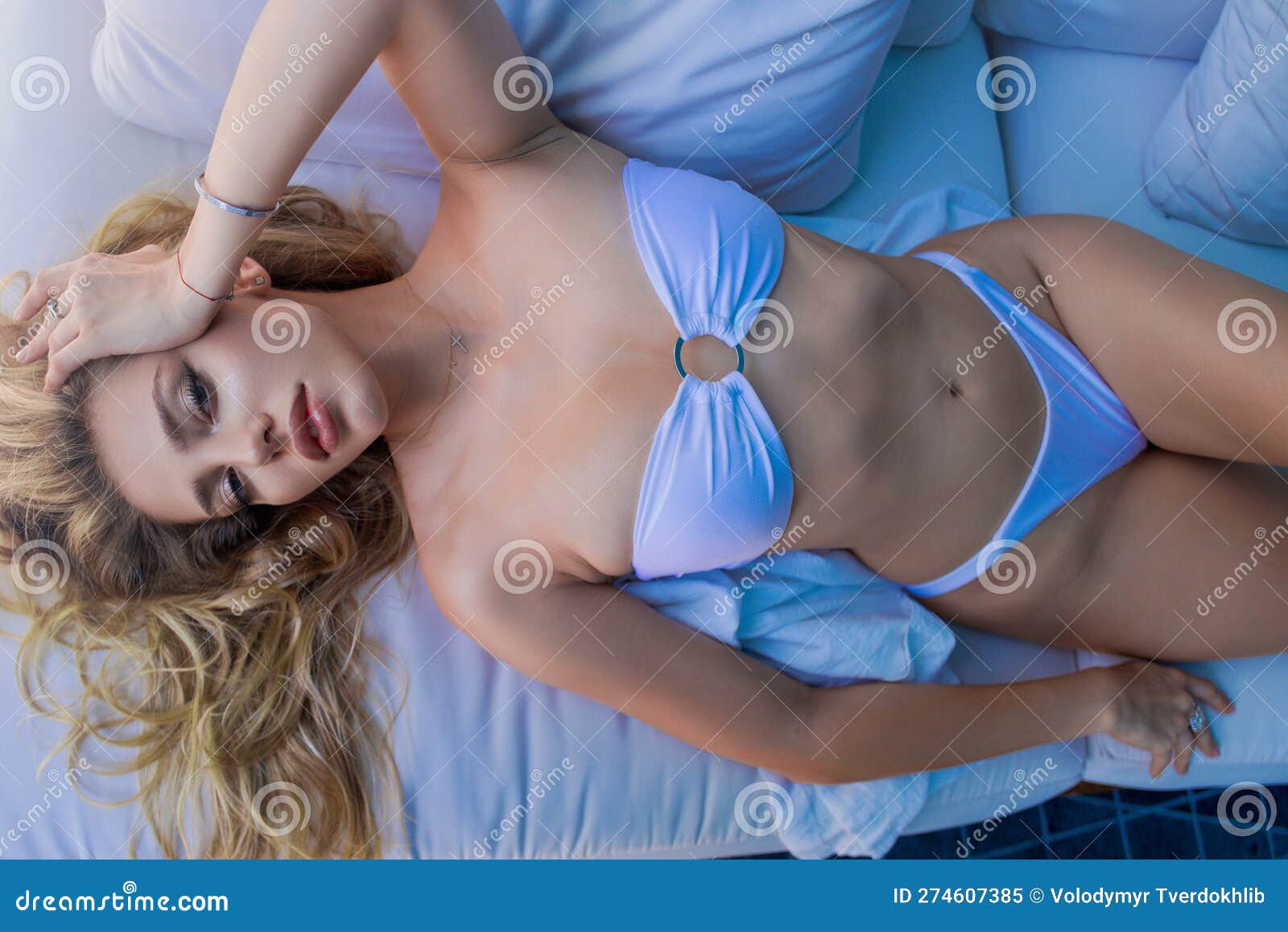 Foto de Woman sleep morning sexy bra on bed do Stock