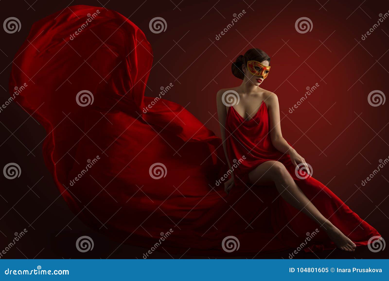woman carnival mask, sensual fashion model in silk gown