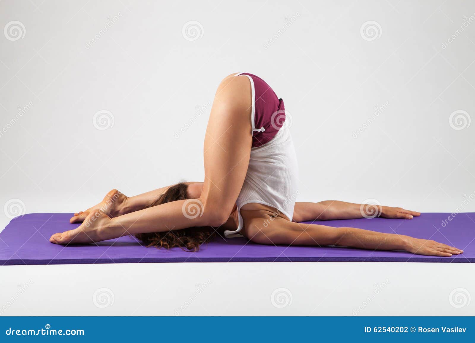 Sexy Woman Doing Yoga Exercises Stock Photo By ©RVAS 90483838