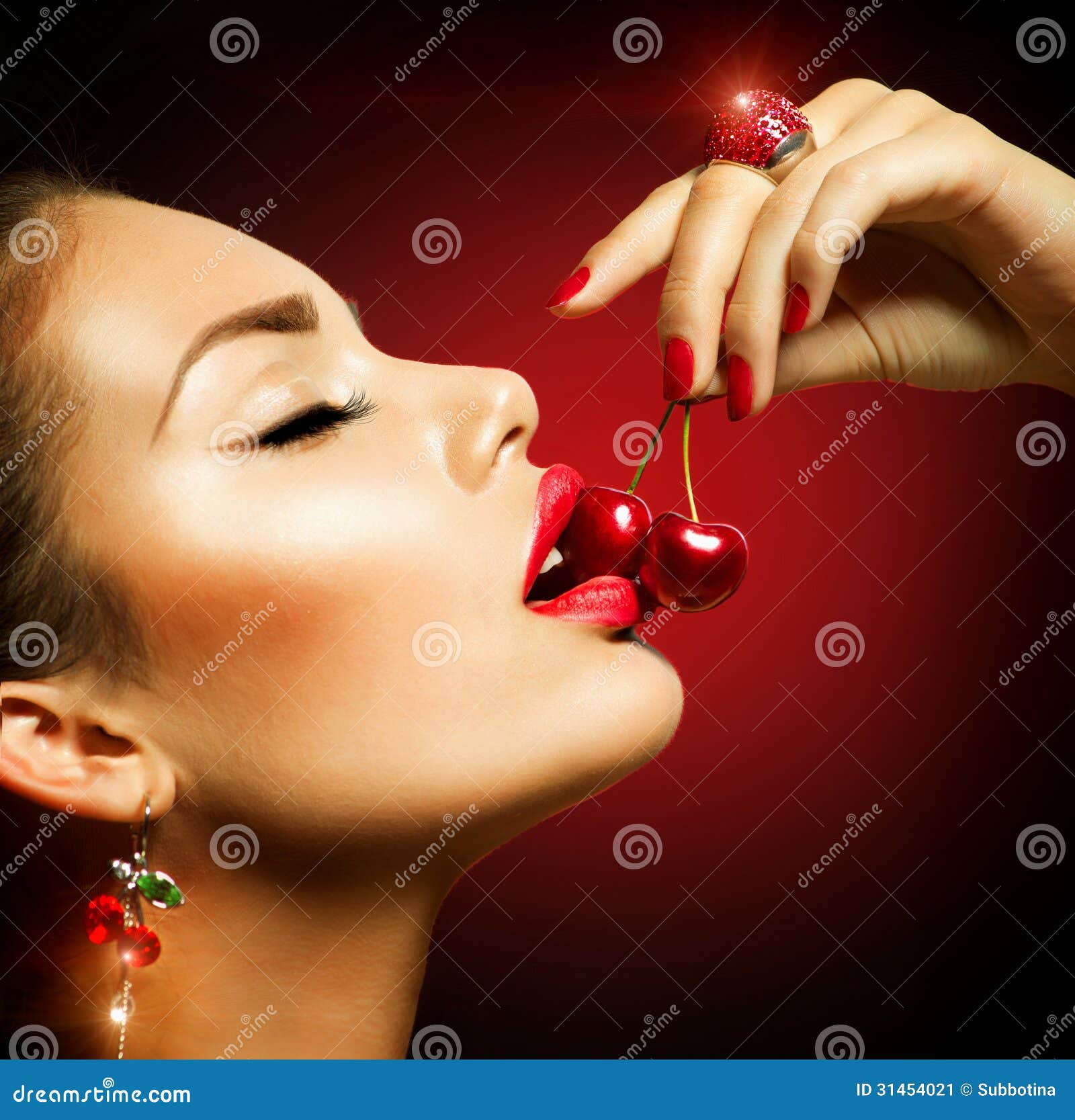 woman eating cherry