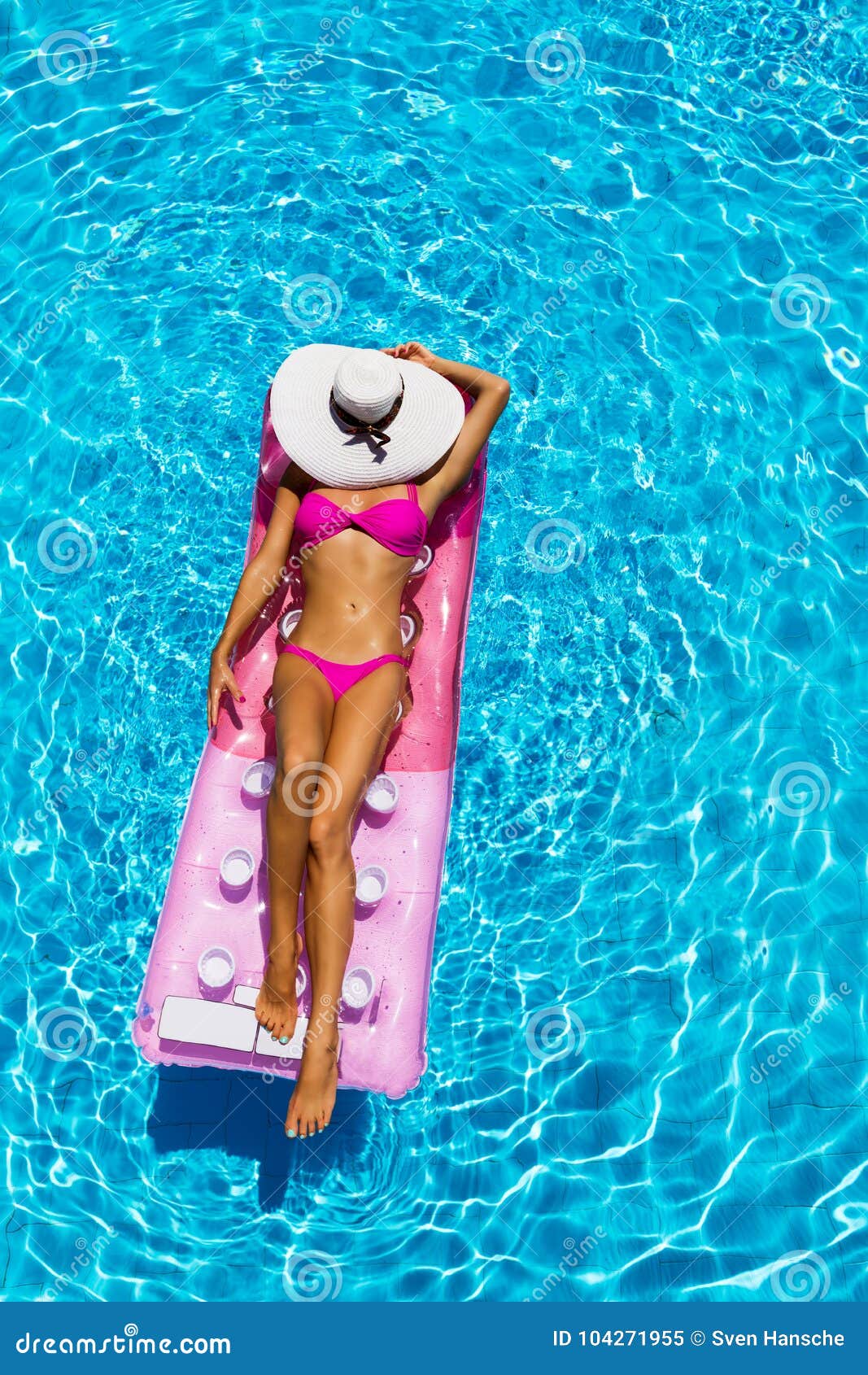 woman on a float in the pool