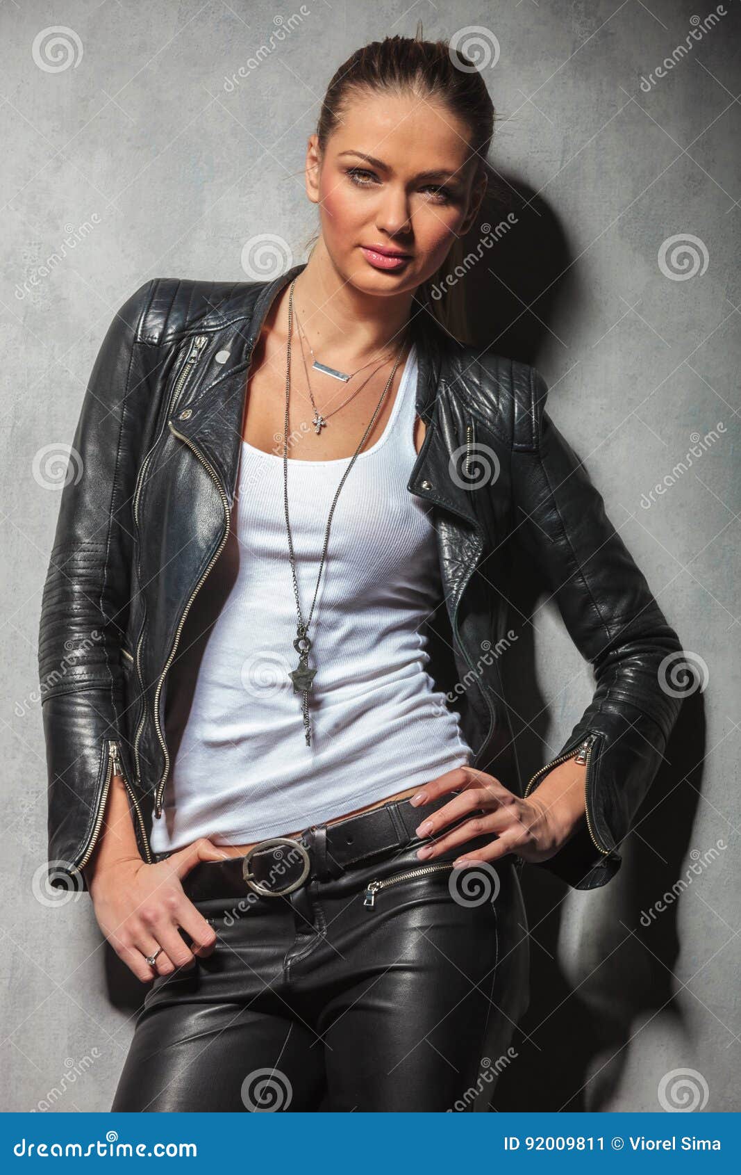 Woman in Leather Clothes with Hands on Waist Stock Image - Image of ...