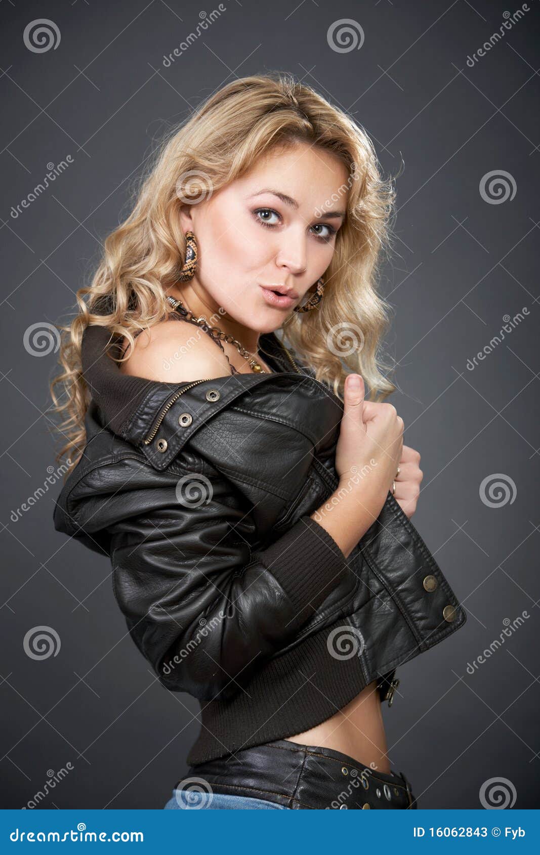 Woman in a Leather Jacket and Jeans Skirt Stock Image - Image of ...