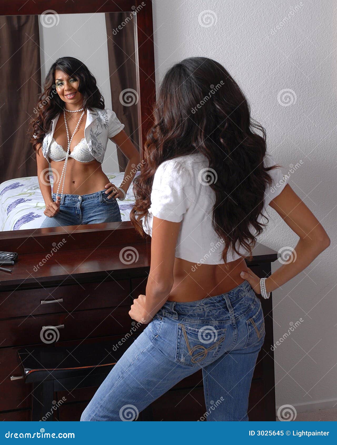 Woman looking in mirror stock image. Image of attractive - 3025645