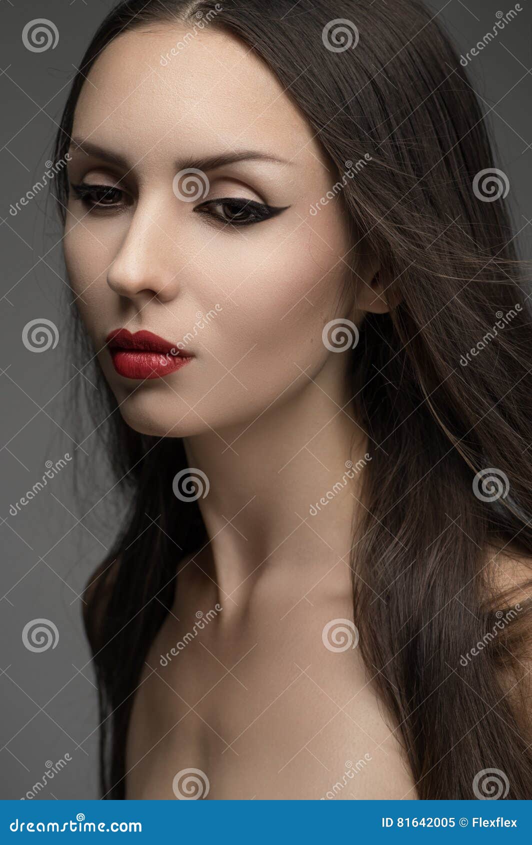 woman with red lips in studio