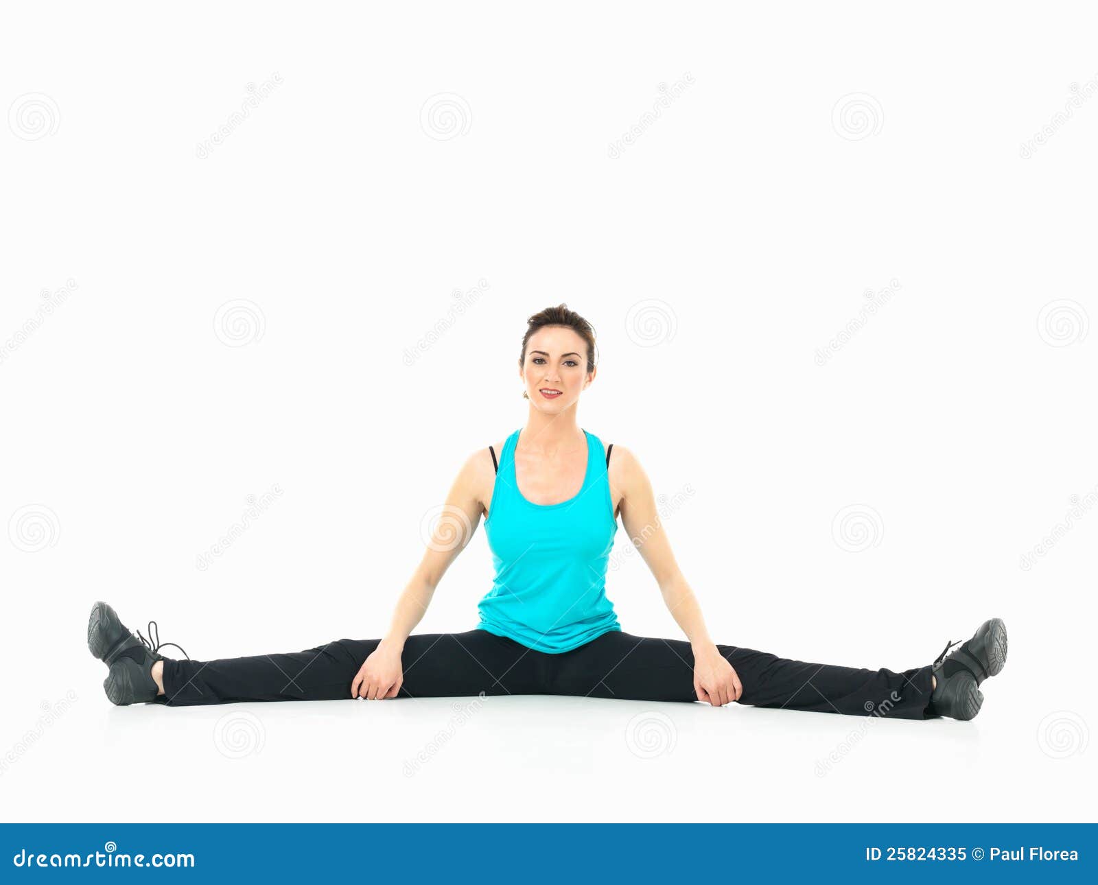 woman showing fitness moves, white background