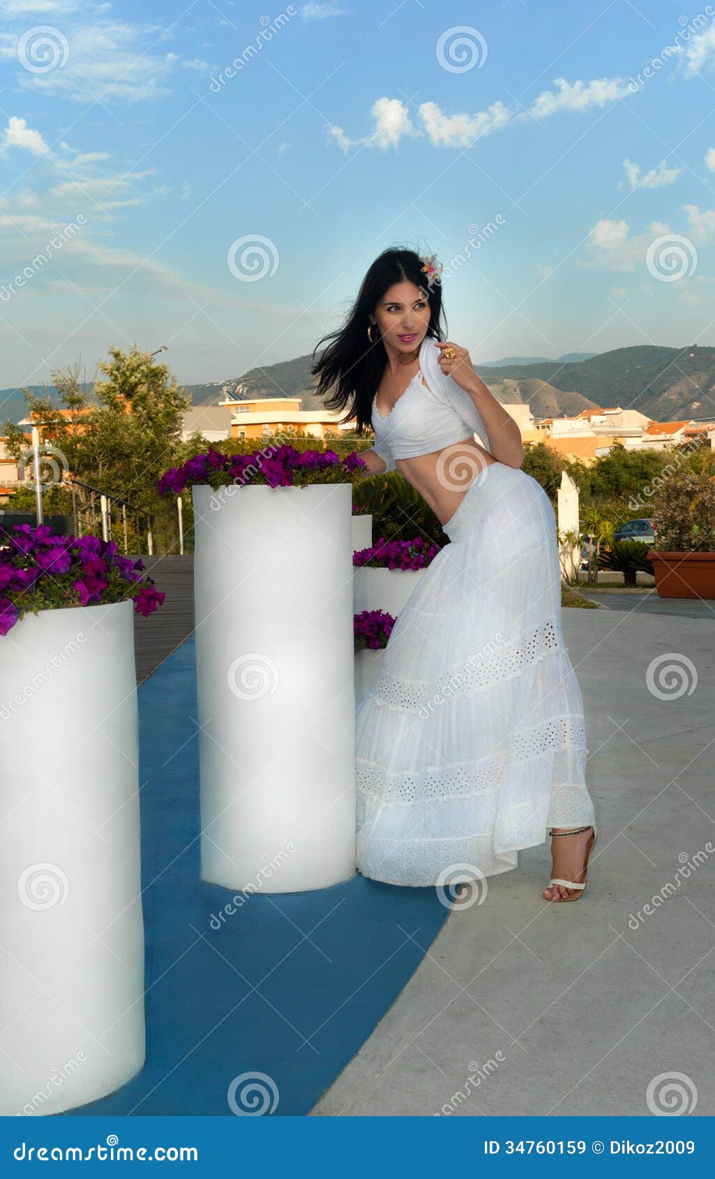 Premium Photo  Seductive sicilian woman sitting on a step in an old town  in sicily