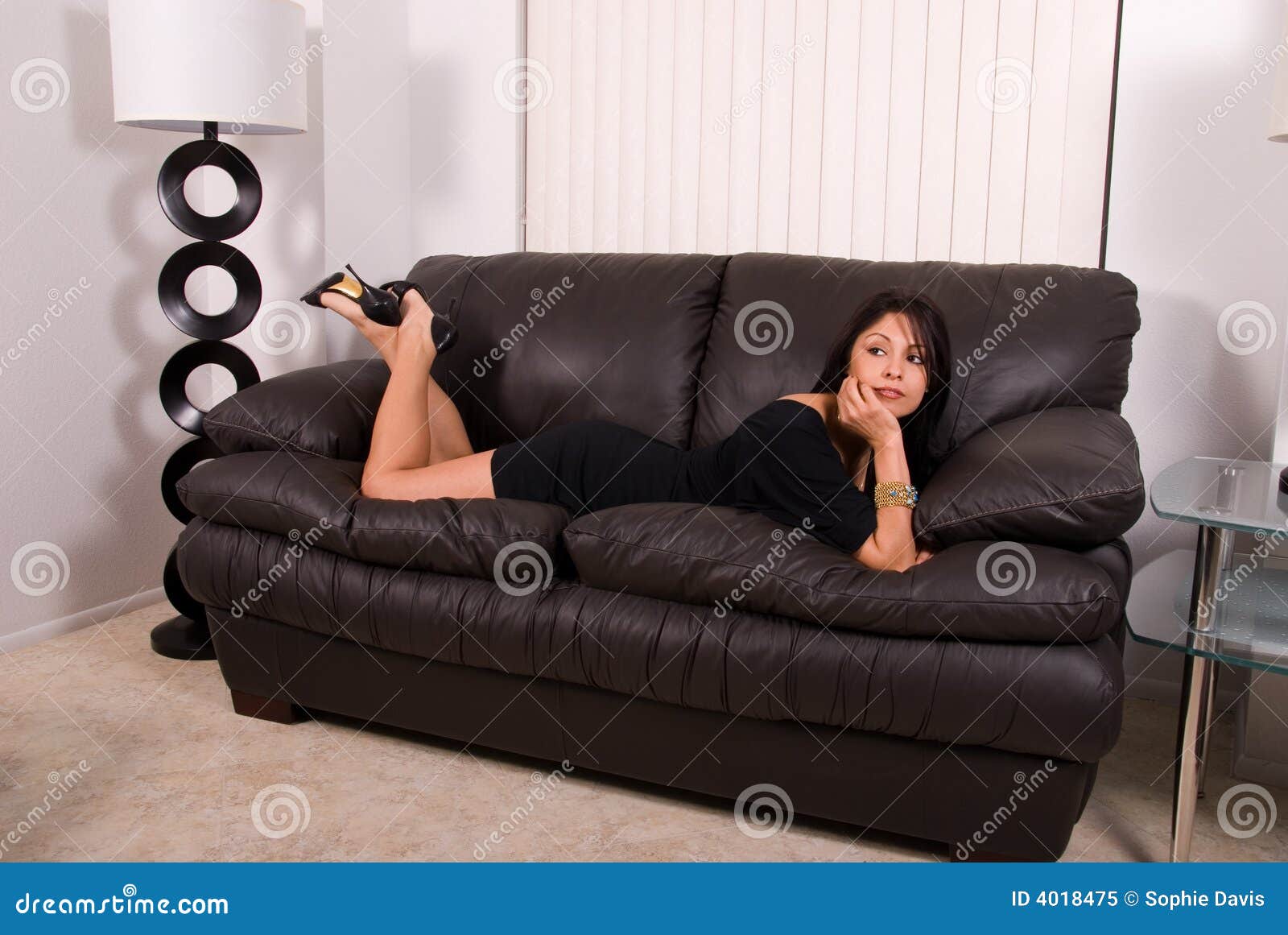 Woman on sofa. stock image. Image of girls, hispanic, lady 4018475