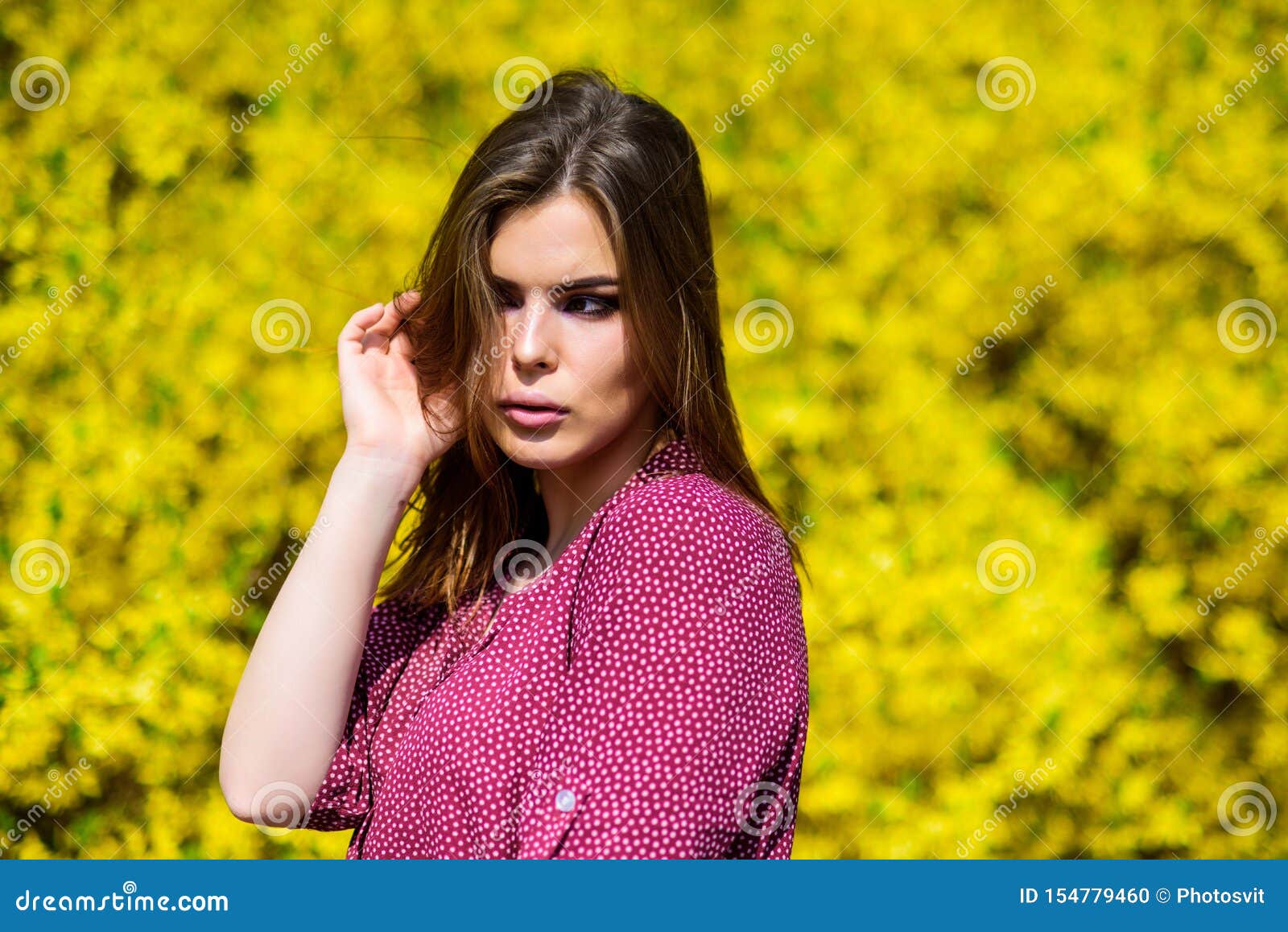 sexy woman in spring blossom. pretty woman skincare. girl like nature. summer blooming trees and yellow flowers. natural