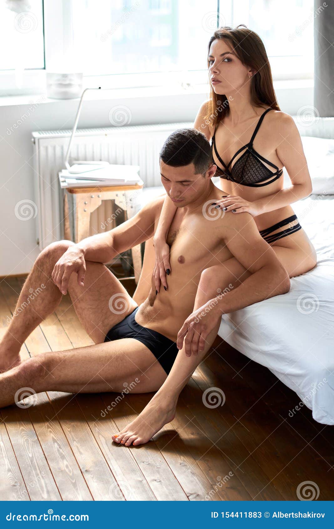 https://thumbs.dreamstime.com/z/sexy-woman-stylish-lingerie-trying-to-support-her-husband-as-has-problems-sexy-women-stylish-lingerie-trying-to-support-154411883.jpg