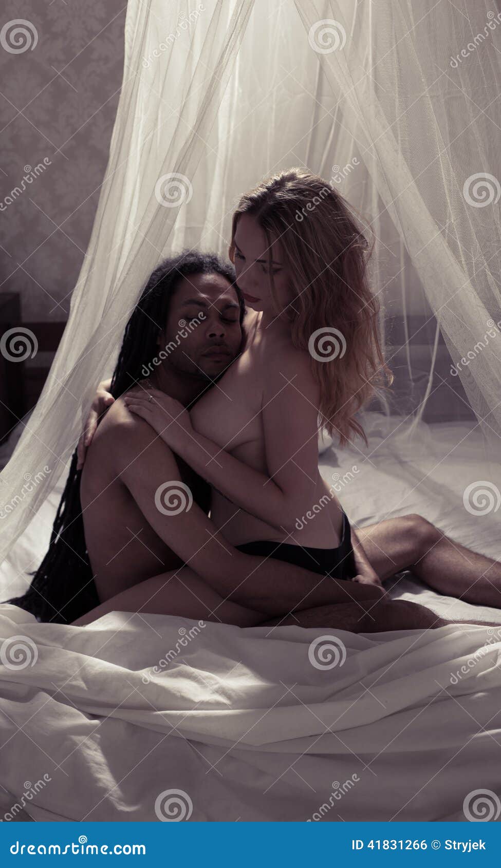 Woman on man in bed stock photo. of - 41831266