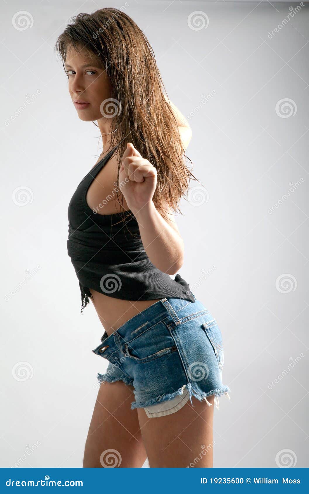 Flirtatious Young Woman in a Cutting Shirt Revealing Her Body Stock Photo -  Image of breasts, fashion: 61275414