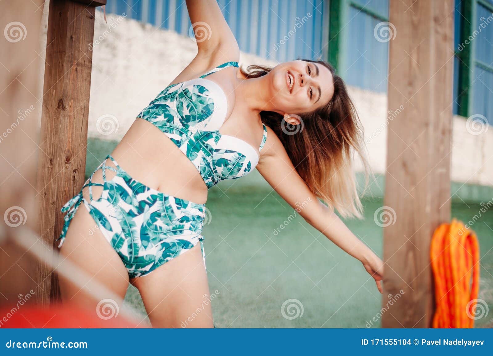 Beautiful funny young brunette model in fake meditation pose, mockery Stock  Photo - Alamy