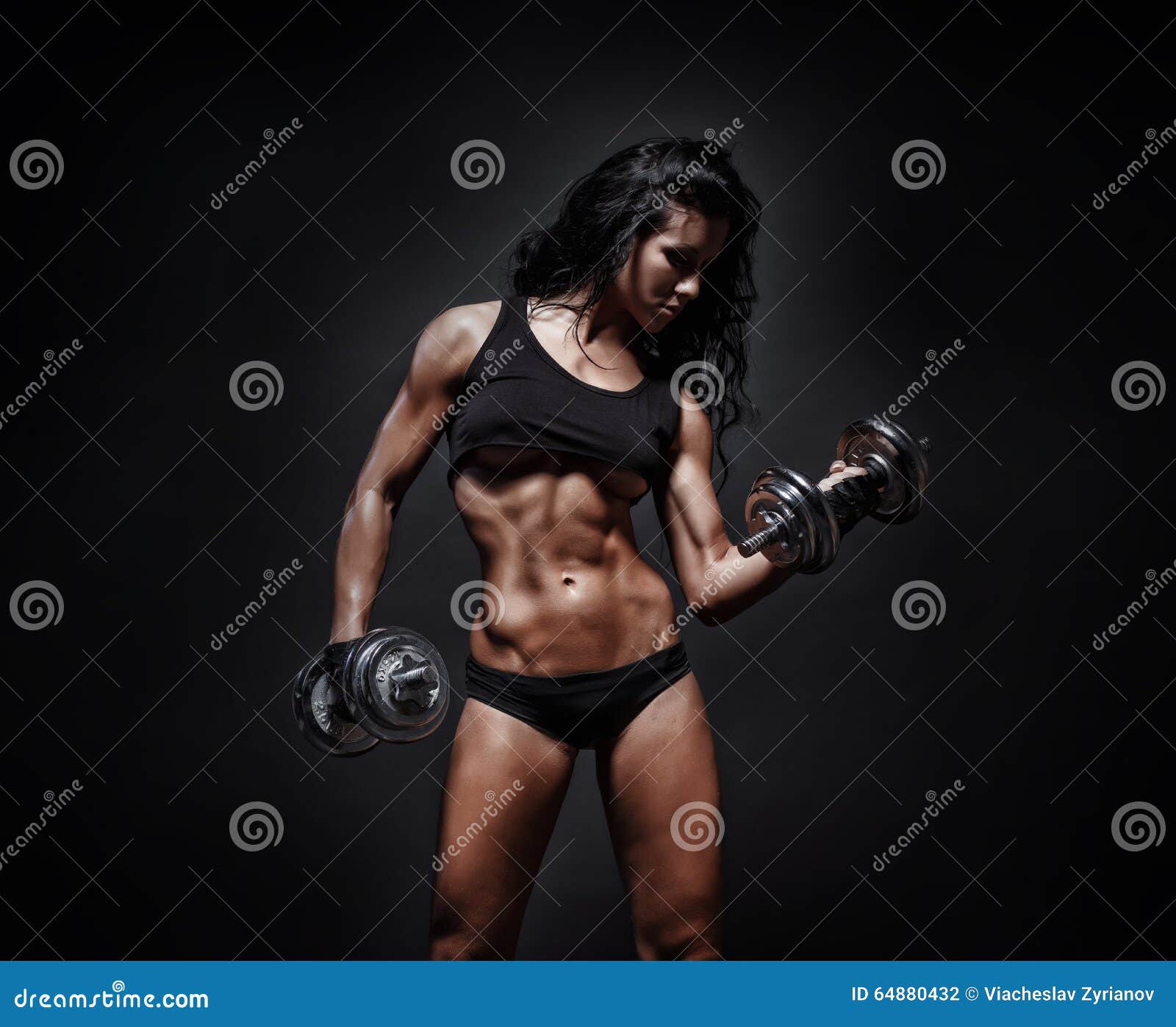 Perfect Fitness Body of Beautiful Woman. Fitness Instructor in Sports  Clothing. Female Model with Fit Muscular and Slim Body in Sportswear. Young  Fit Girl Lifting Dumbbells Photos