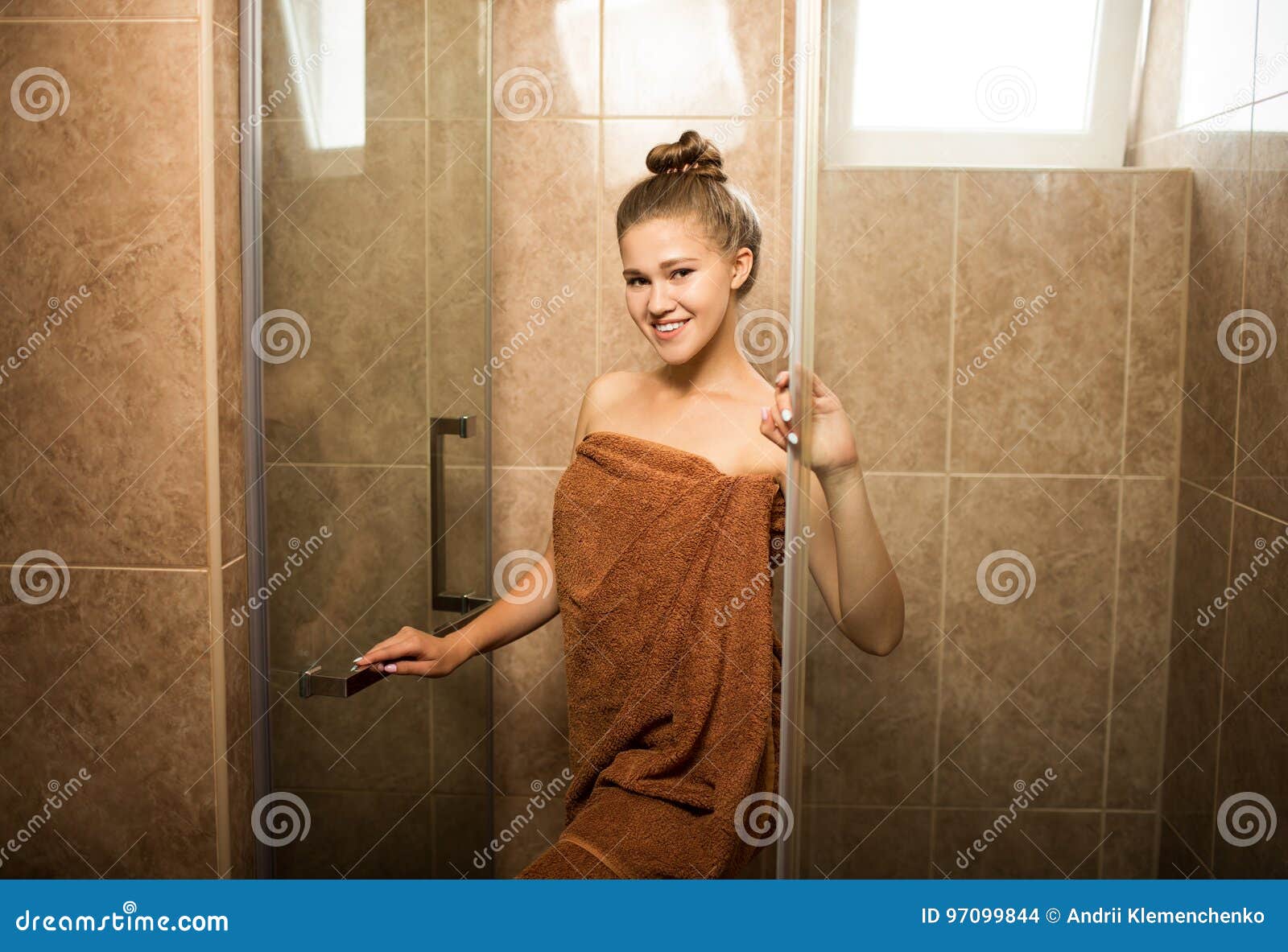 Sexy Young Girl Takes A Shower In The Bathroom On A Brown Tile 