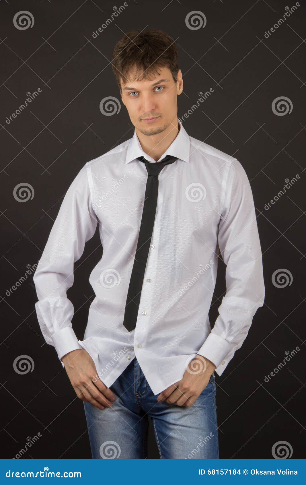 Young Man in a White Shirt with a Black Tie and Expensive C Stock Photo ...