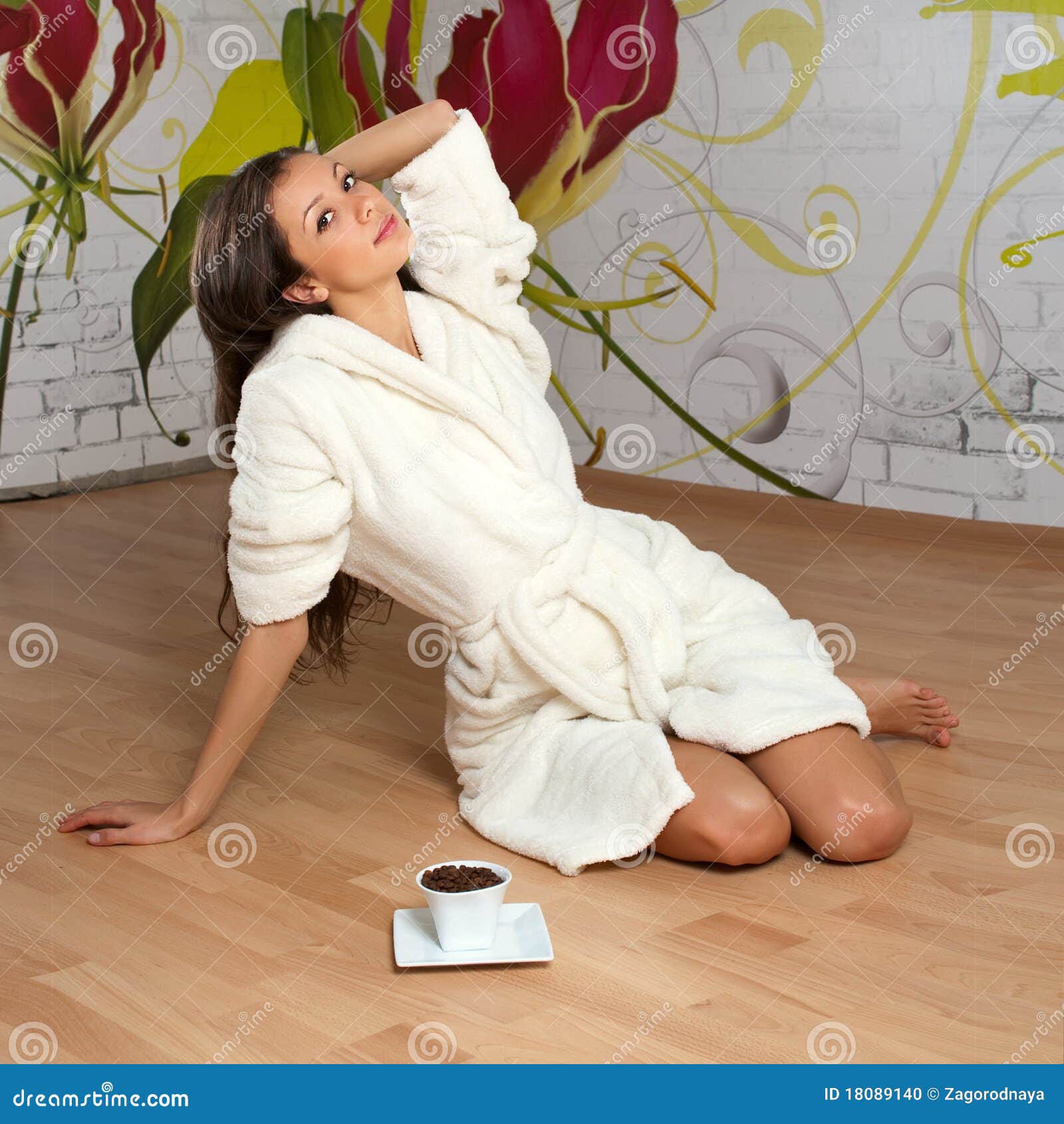 Young woman in a bathrobe stock photo. Image of female 18089140