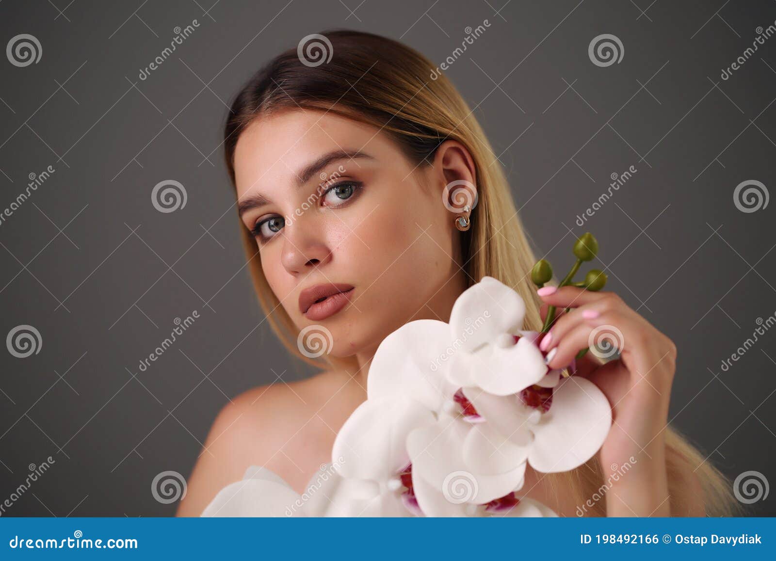 Young Woman with Flowers - Beautiful Portrait of a Woman with Bright