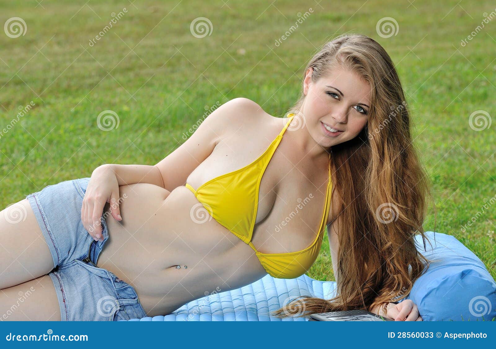 Young women taking off bikini tops, Lost Lake, Oregon, USA Stock