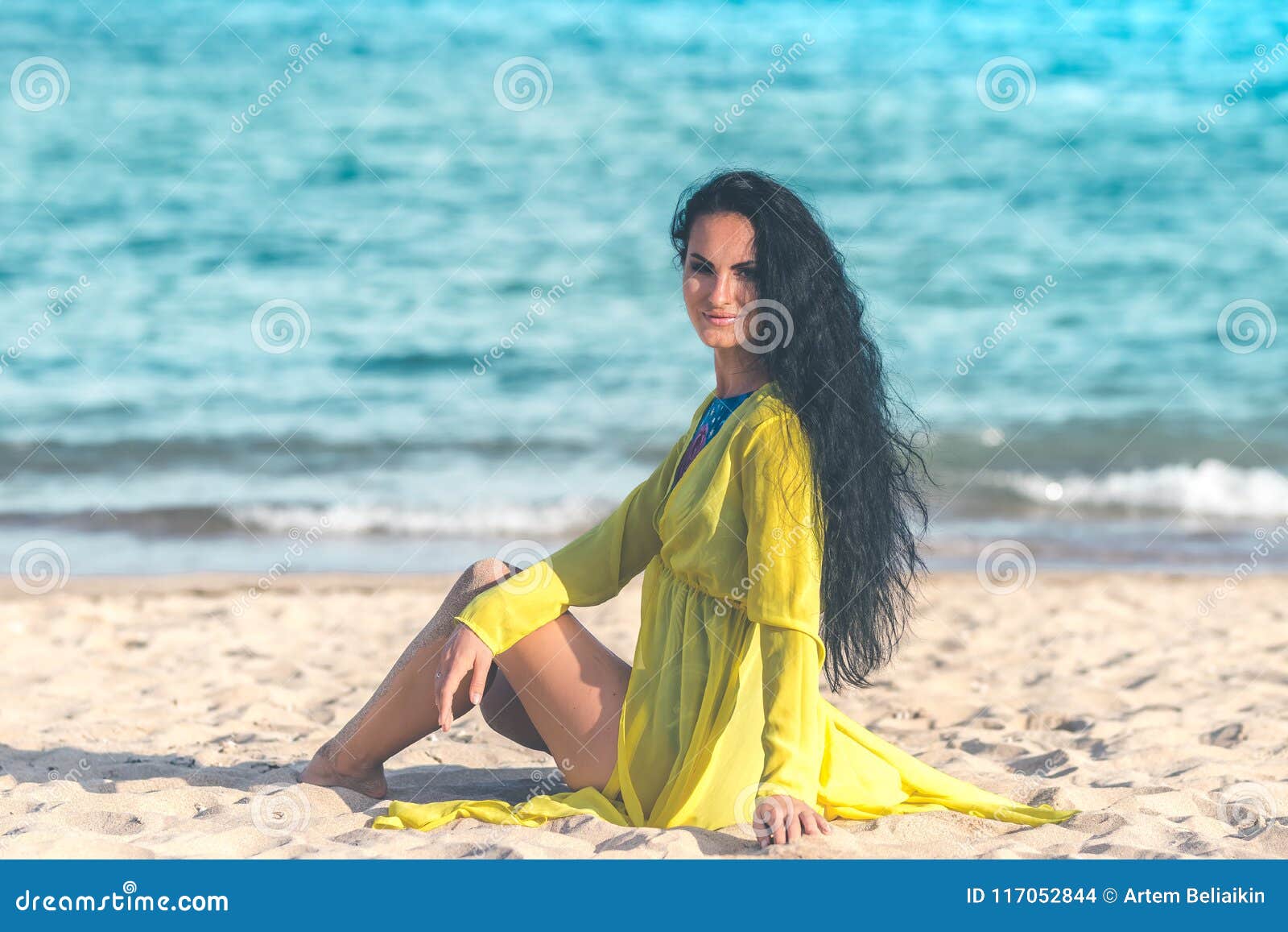 Young Woman Posing on the Tropical Beach of Bali Island, Indonesia photo pic