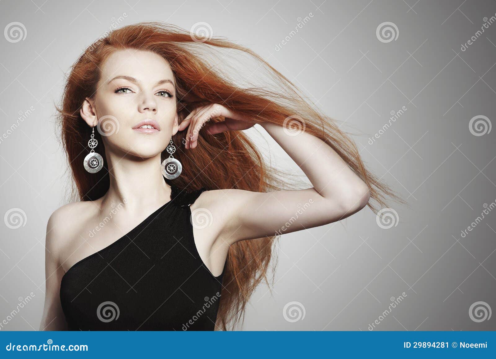 young woman with scatter red hair