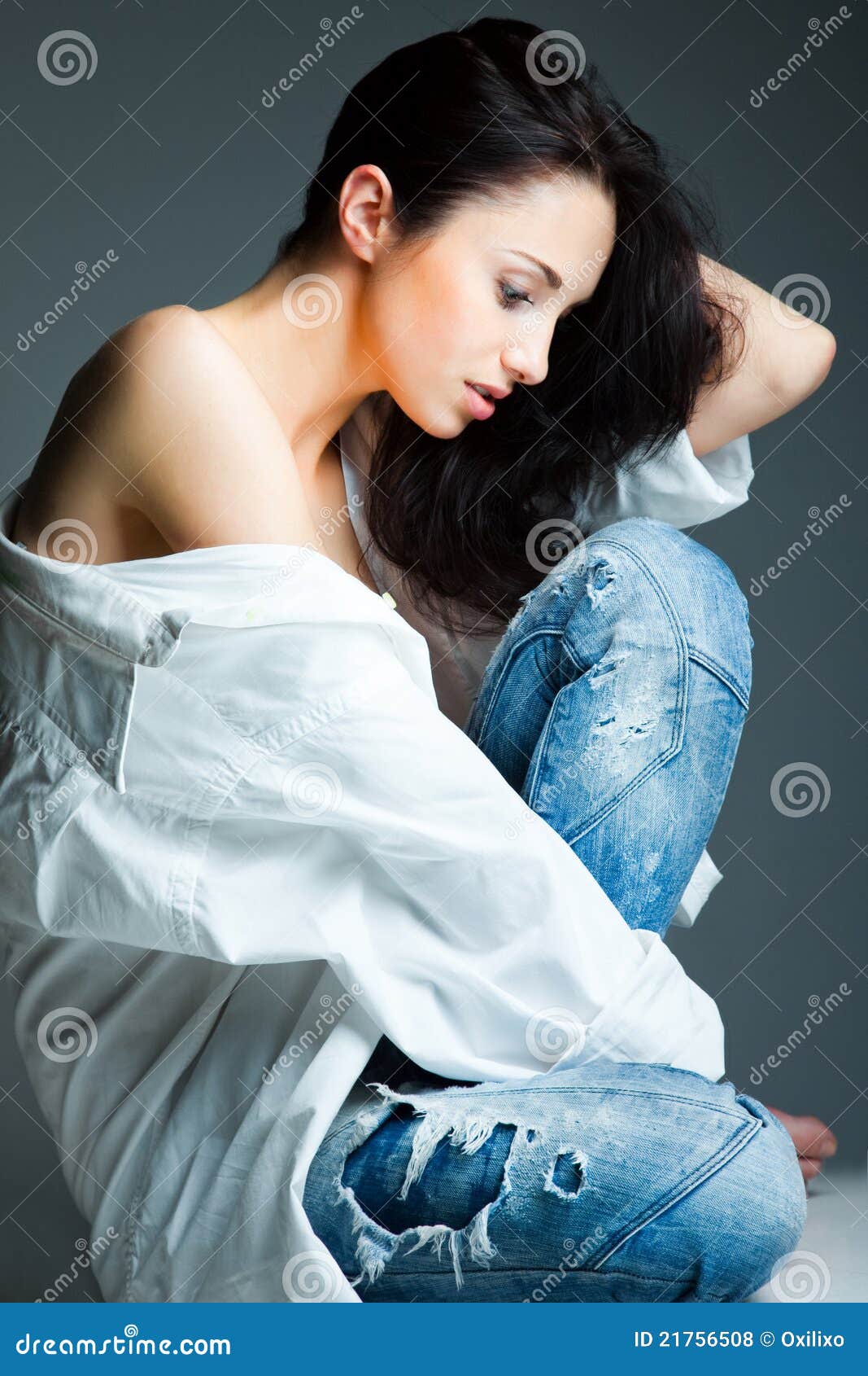 Young Woman on Wearing Blue Jeans Stock Photo - Image of beauty, gray ...