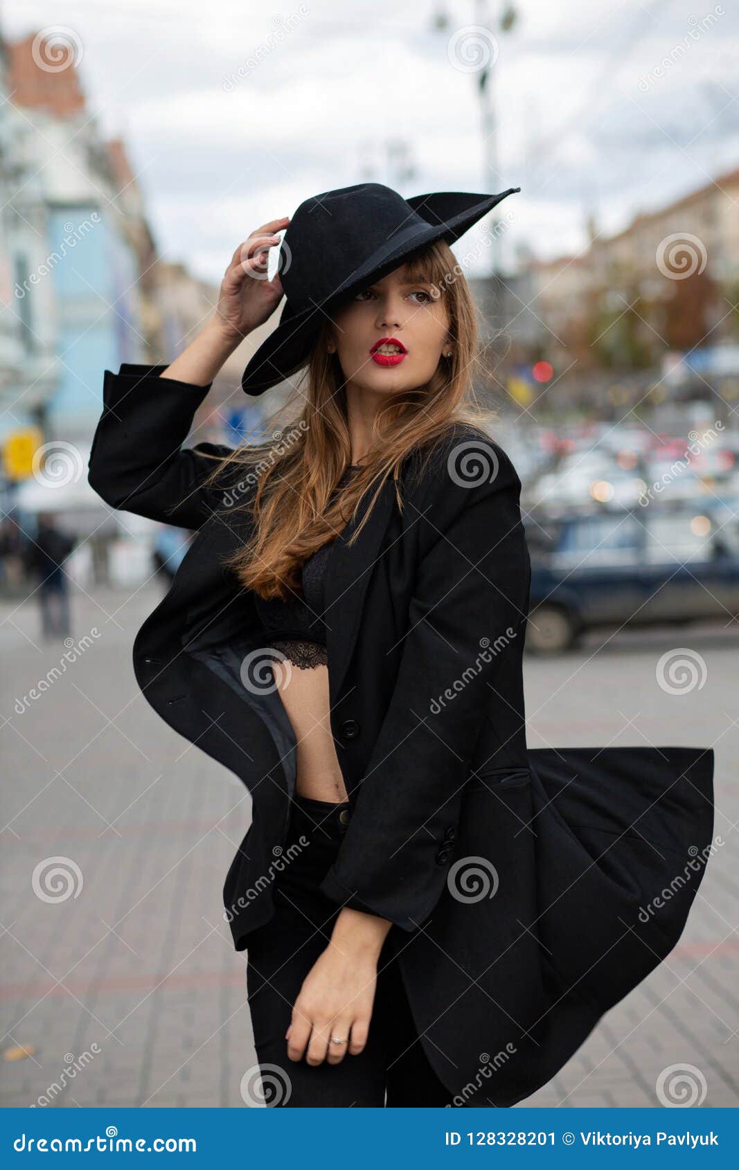 Young Model Wearing Lace Bra, Hat and Jacket Posing with a Stock Image ...